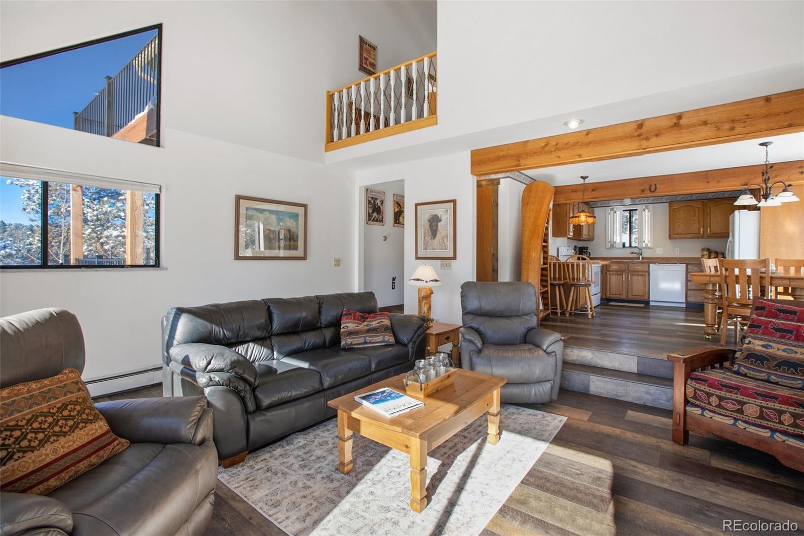 170 Ridge Road Divide, CO 80814 - Photo 14 of 50 a living room with furniture and a rug