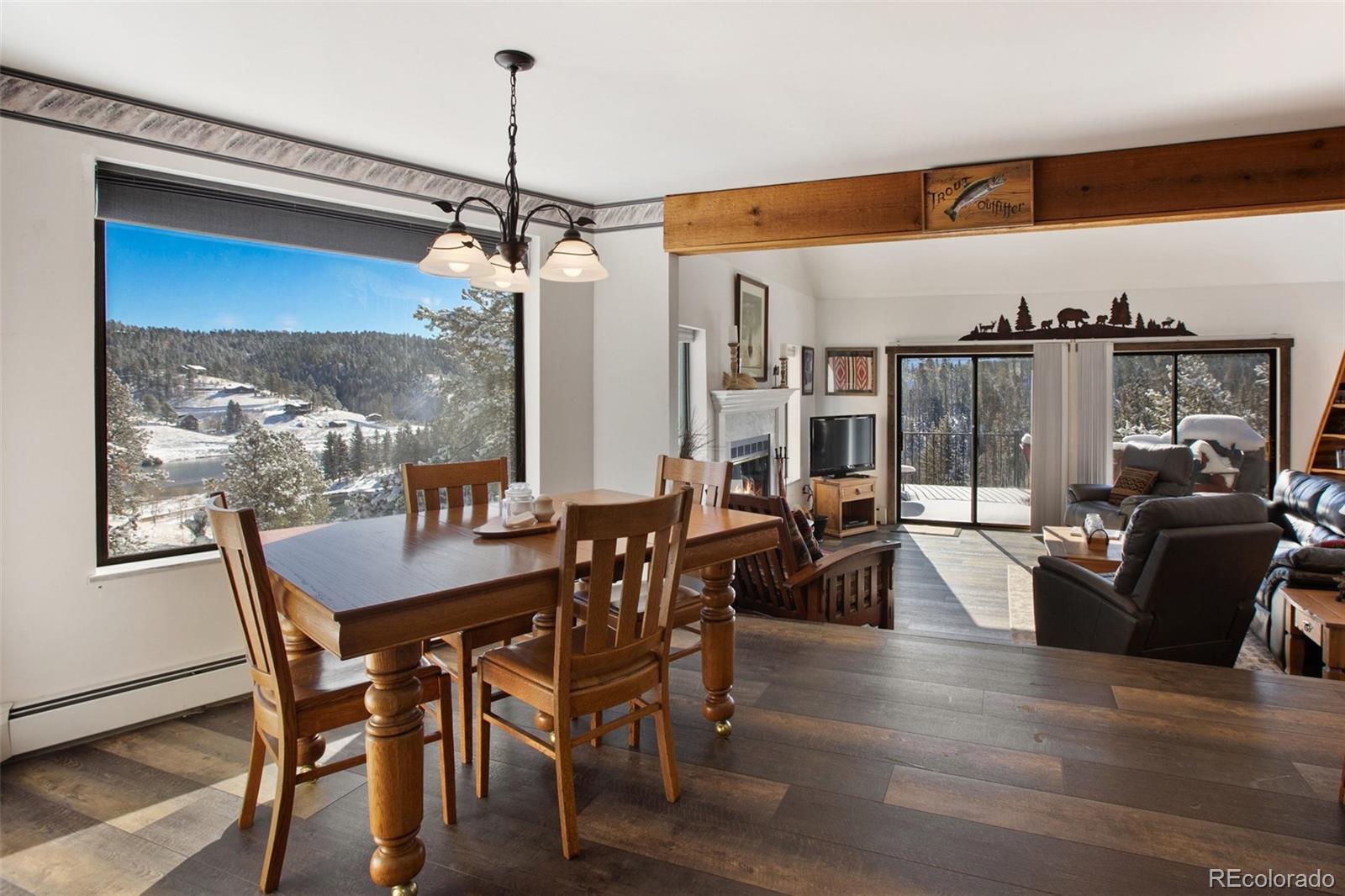 170 Ridge Road Divide, CO 80814 - Photo 16 of 50 a view of a dining room with furniture window and outside view