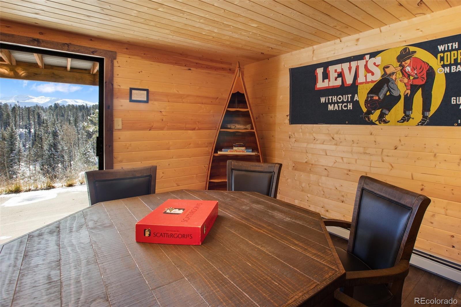 170 Ridge Road Divide, CO 80814 - Photo 33 of 50 a view of a patio with a table and chairs