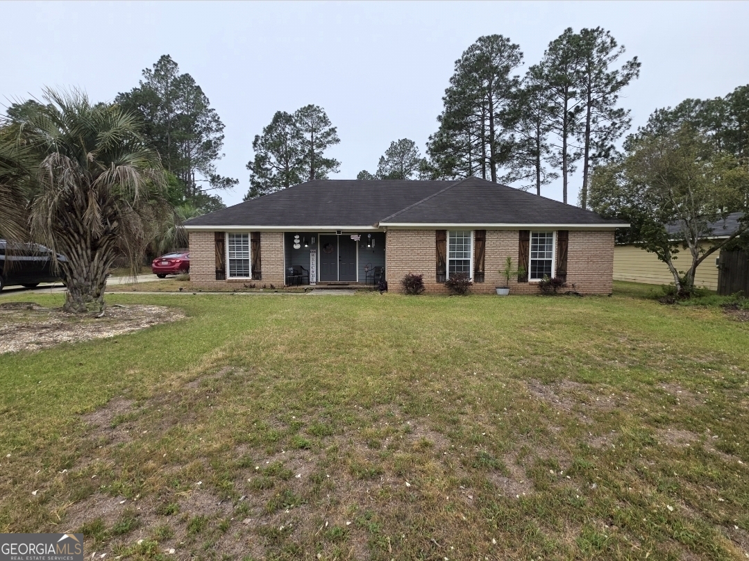 110 Maggie Court Leesburg, GA 31763 - Photo 1 of 64 a view of a house with a big yard and large trees