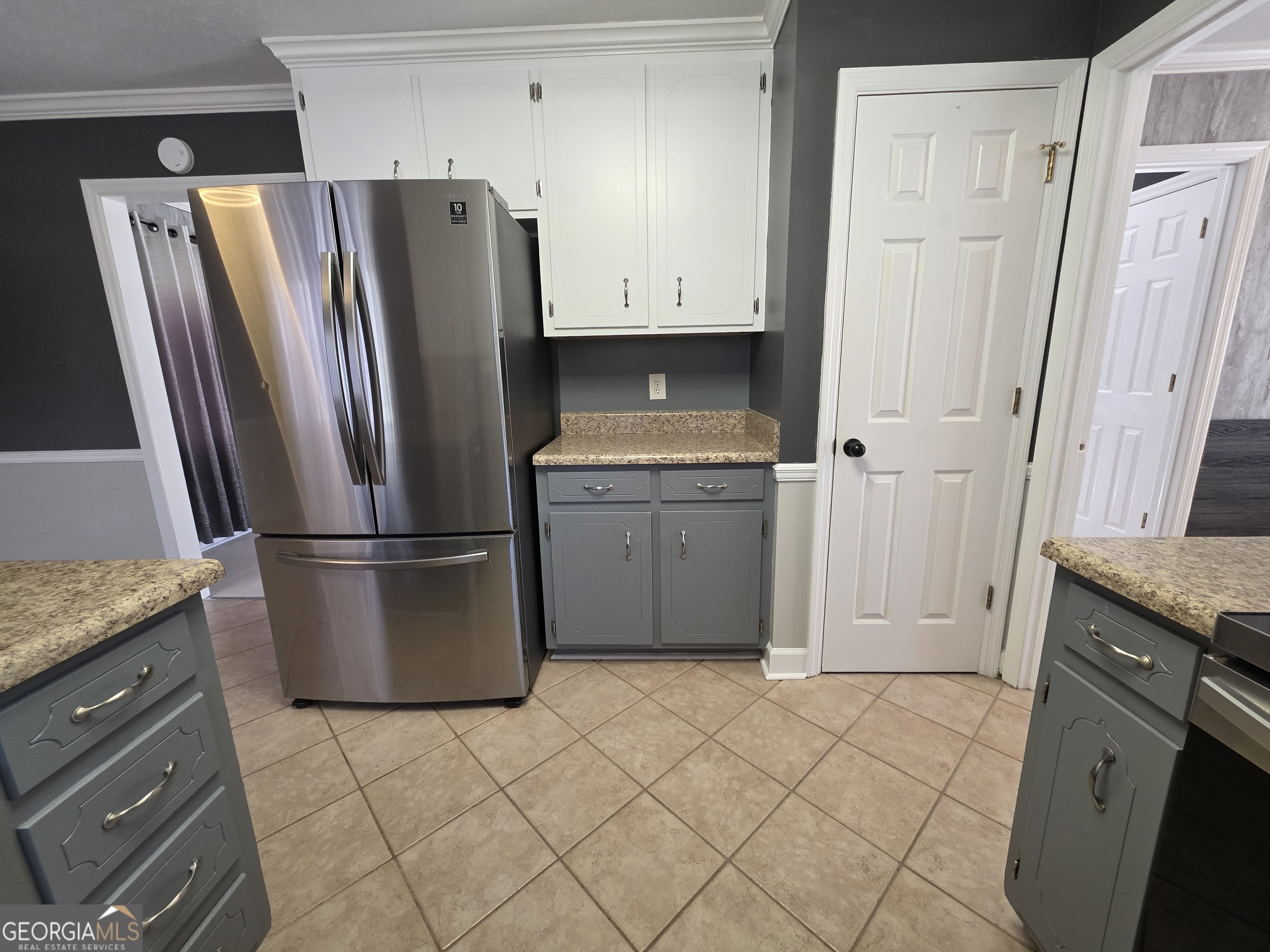 110 Maggie Court Leesburg, GA 31763 - Photo 12 of 64 a kitchen with stainless steel appliances granite countertop a refrigerator and a stove