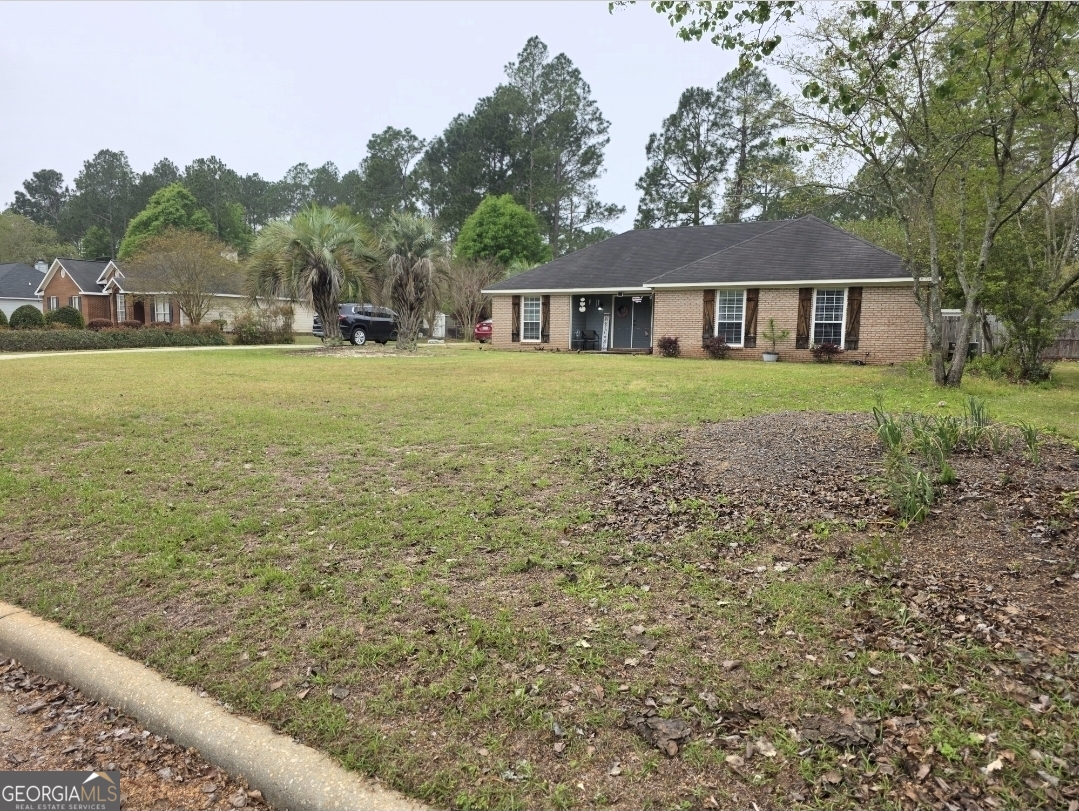 110 Maggie Court Leesburg, GA 31763 - Photo 2 of 64 a front view of a house with a yard
