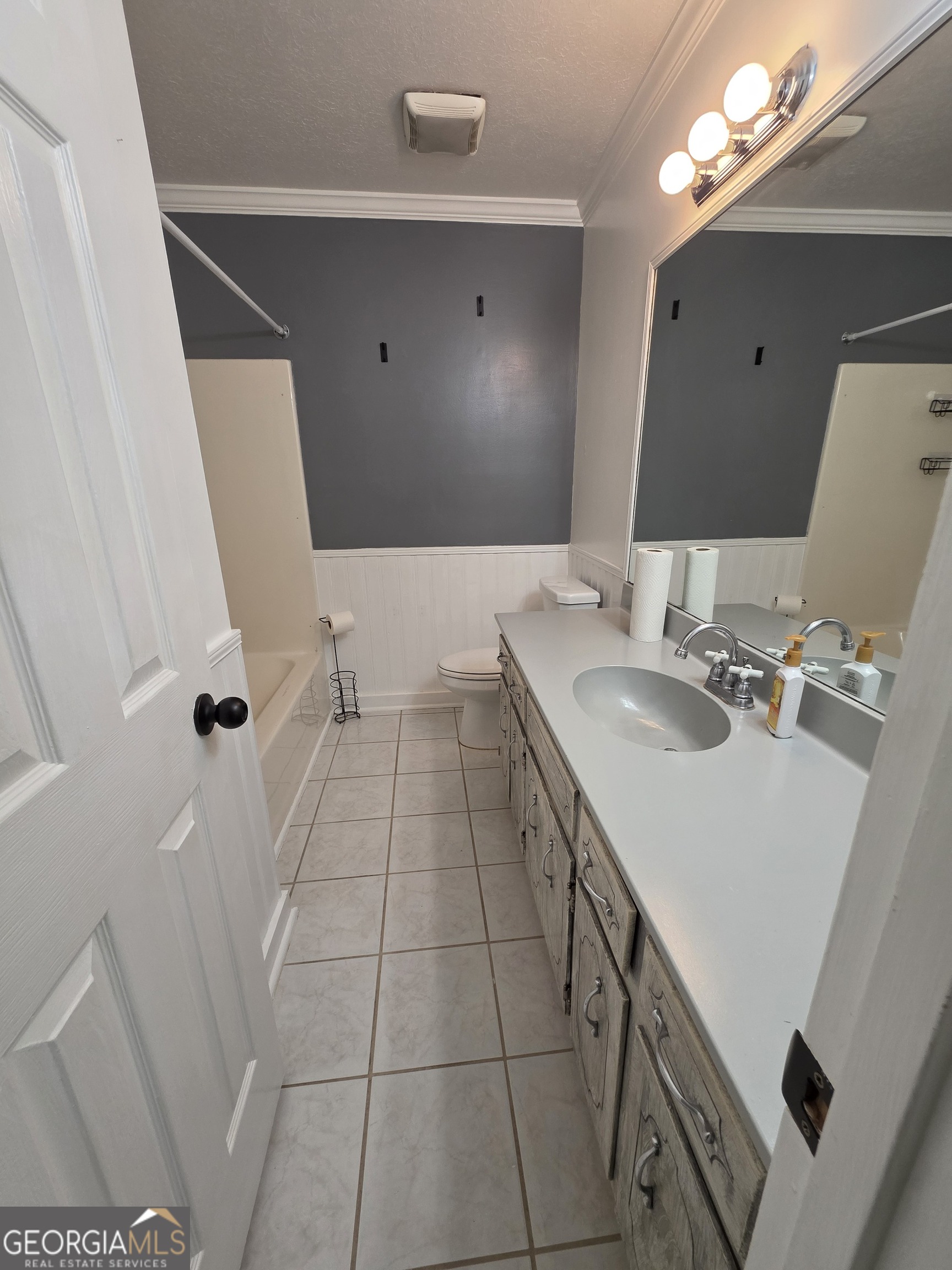 110 Maggie Court Leesburg, GA 31763 - Photo 21 of 64 a bathroom with a sink vanity and mirror