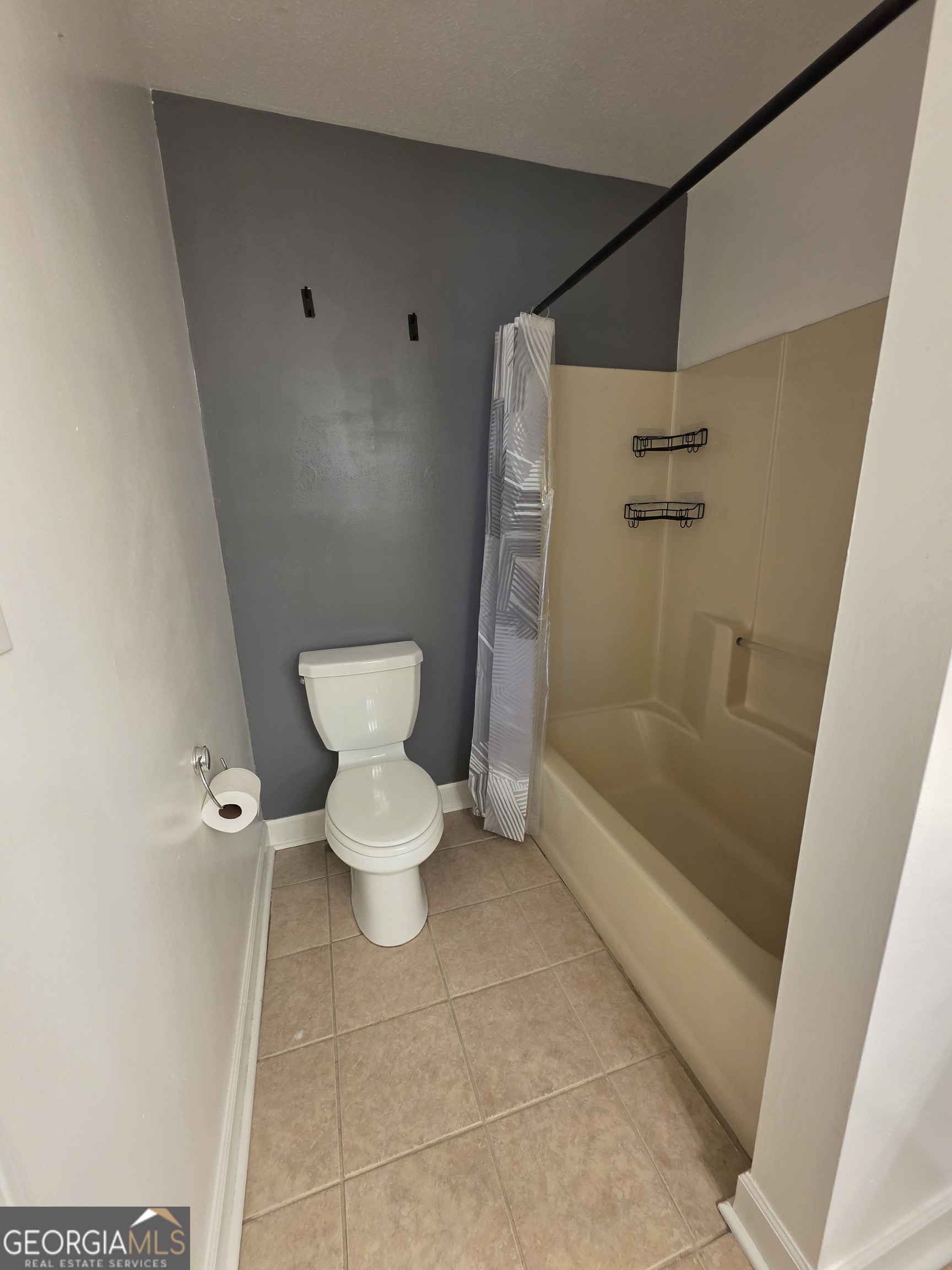 110 Maggie Court Leesburg, GA 31763 - Photo 27 of 64 a bathroom with a toilet and a shower