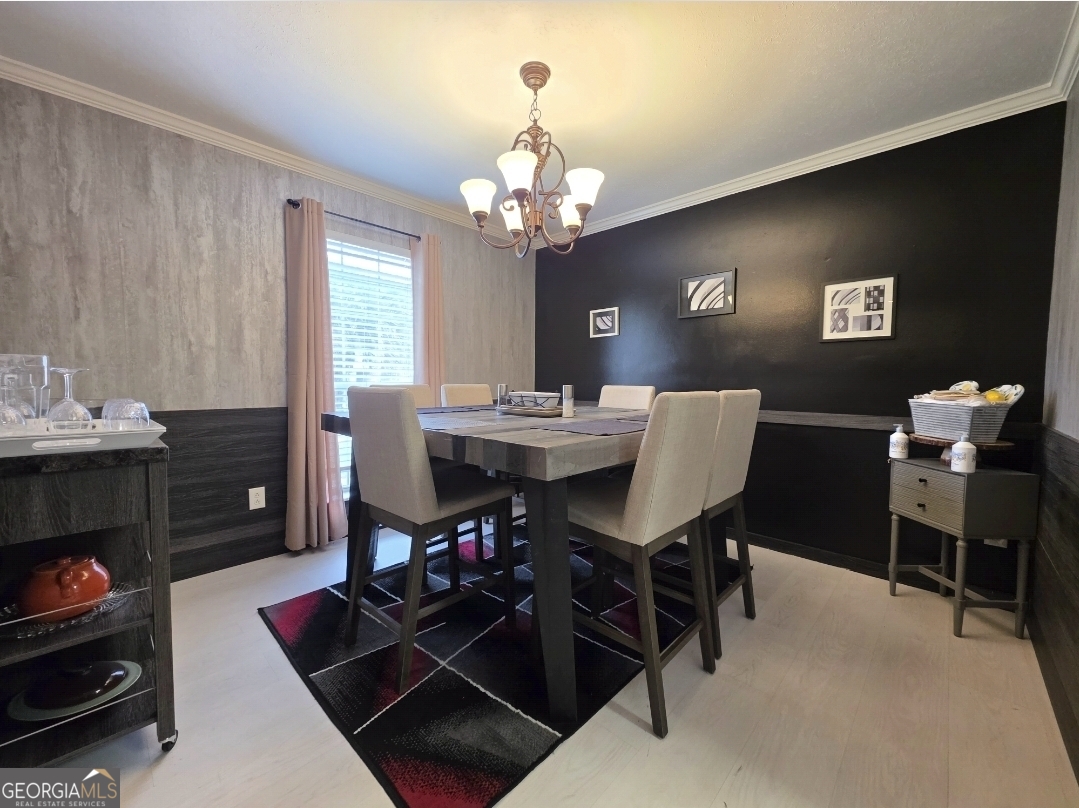 110 Maggie Court Leesburg, GA 31763 - Photo 36 of 64 a view of a dining room with furniture and a chandelier