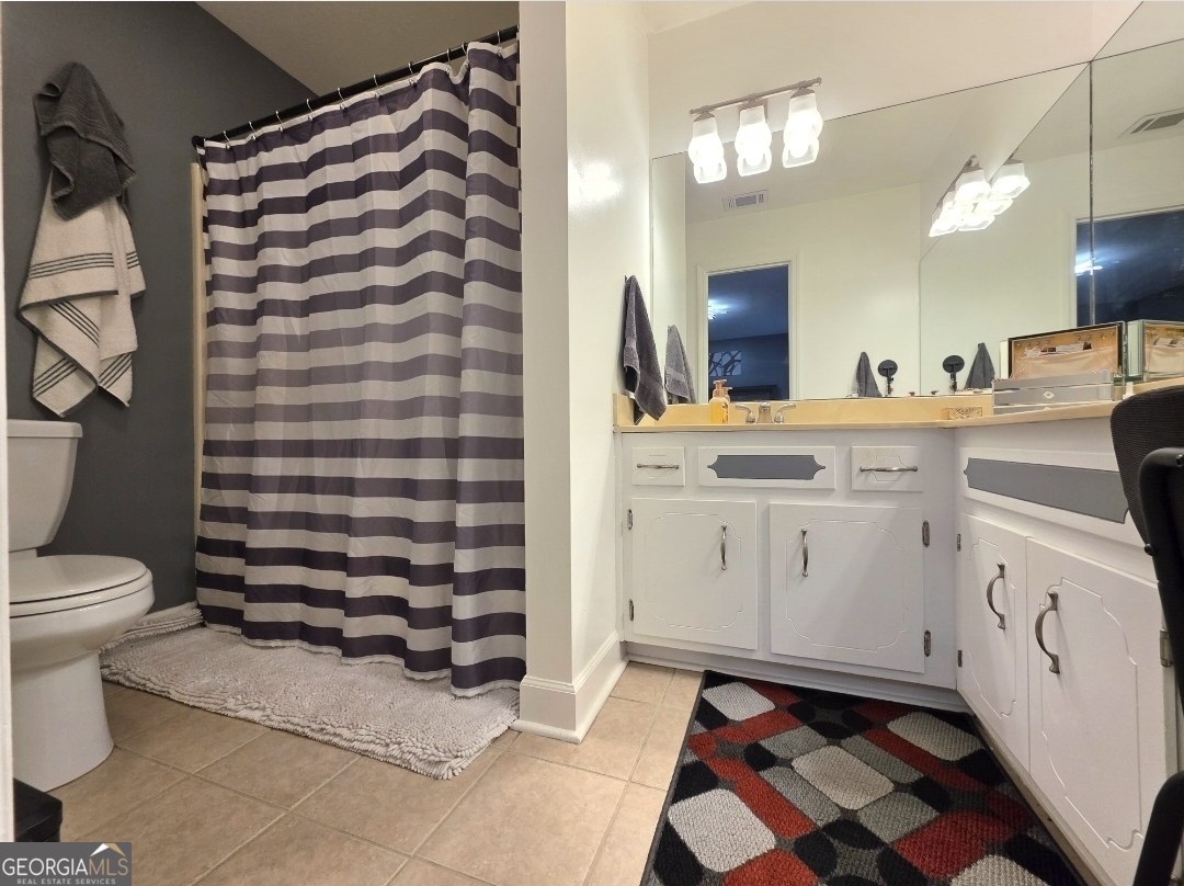 110 Maggie Court Leesburg, GA 31763 - Photo 53 of 64 a bathroom with a sink and a mirror