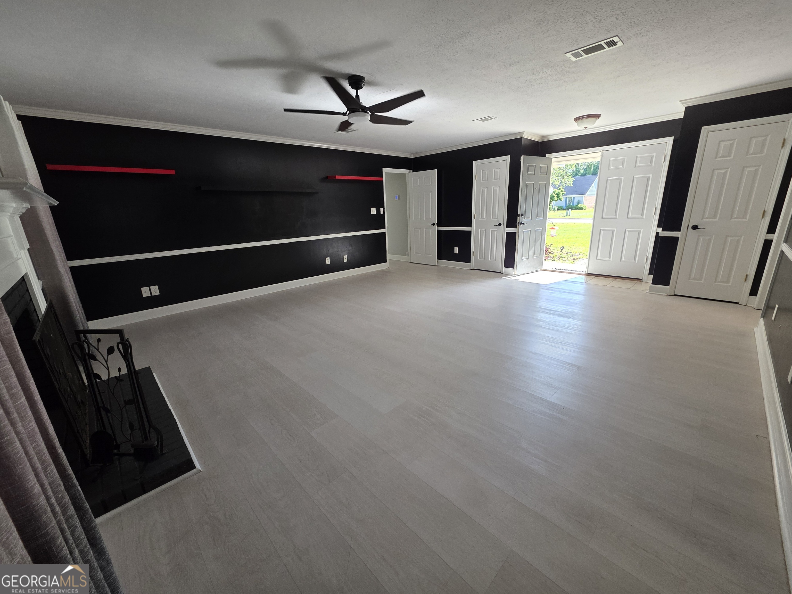 110 Maggie Court Leesburg, GA 31763 - Photo 6 of 64 a view of an empty room with a window