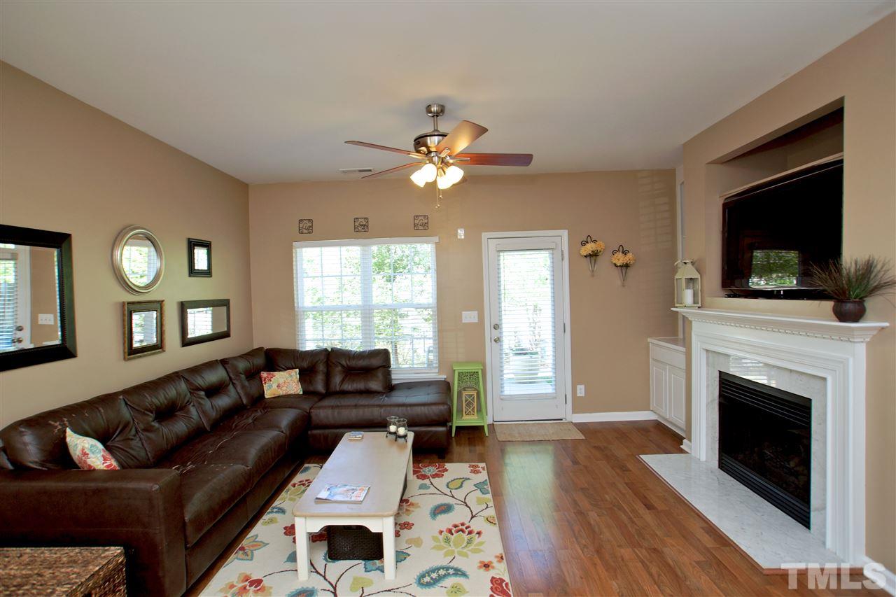 2161 Metacomet Way Raleigh, NC 27604 - Photo 3 of 21 a living room with furniture and a fireplace
