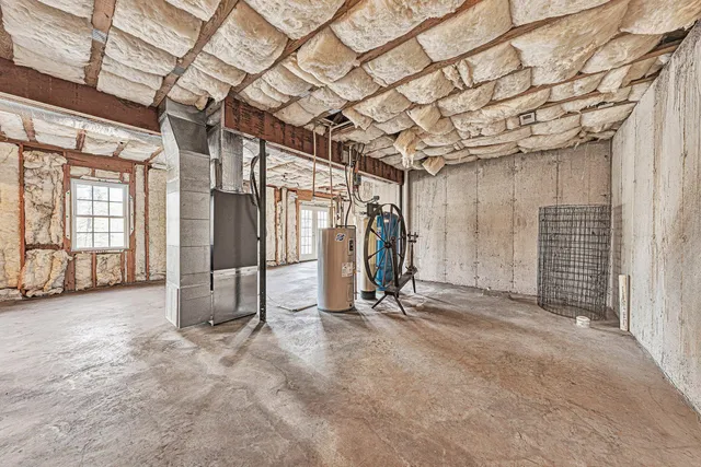a view of a room with wooden walls