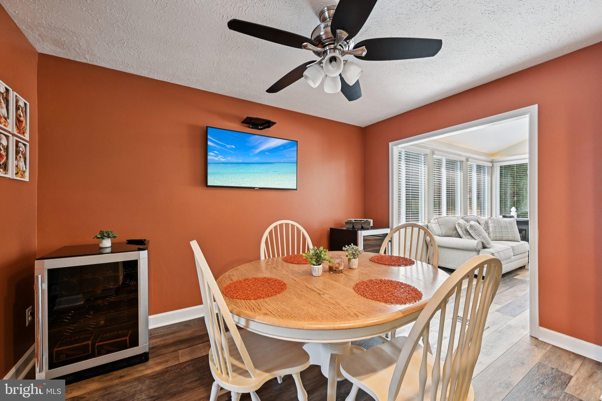 46 Bellfalls Way Baltimore, MD 21236 - Photo 23 of 65 a dining room with furniture a chandelier and wooden floor
