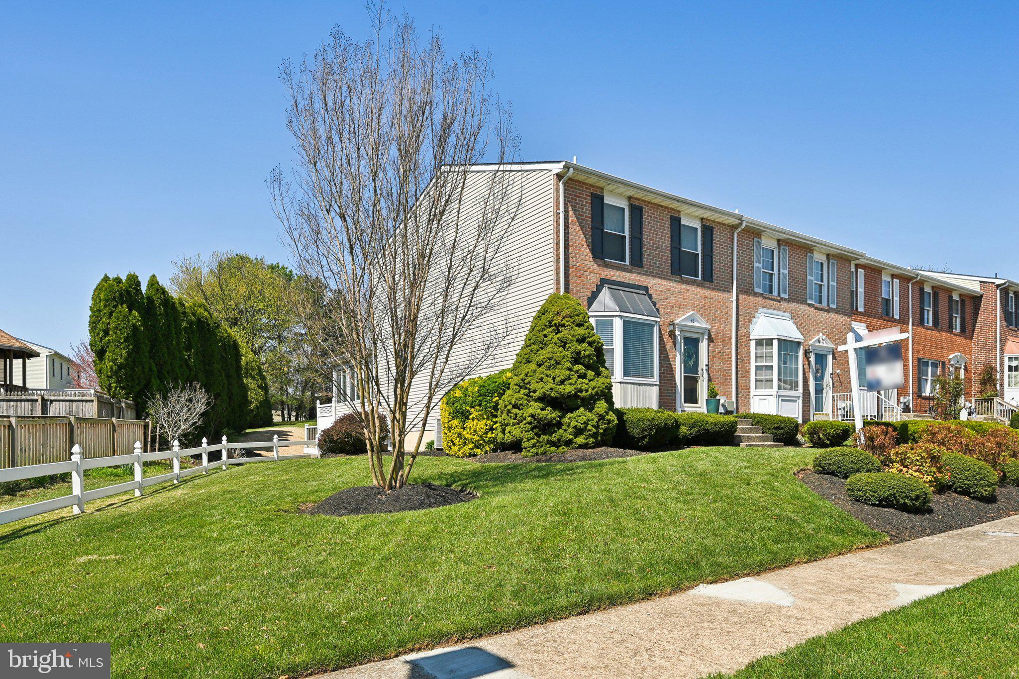46 Bellfalls Way Baltimore, MD 21236 - Photo 3 of 65 a front view of a house with a yard