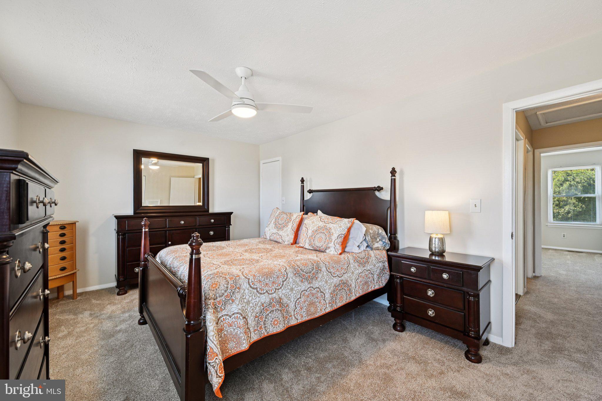 46 Bellfalls Way Baltimore, MD 21236 - Photo 31 of 65 a bedroom with a bed and a tv