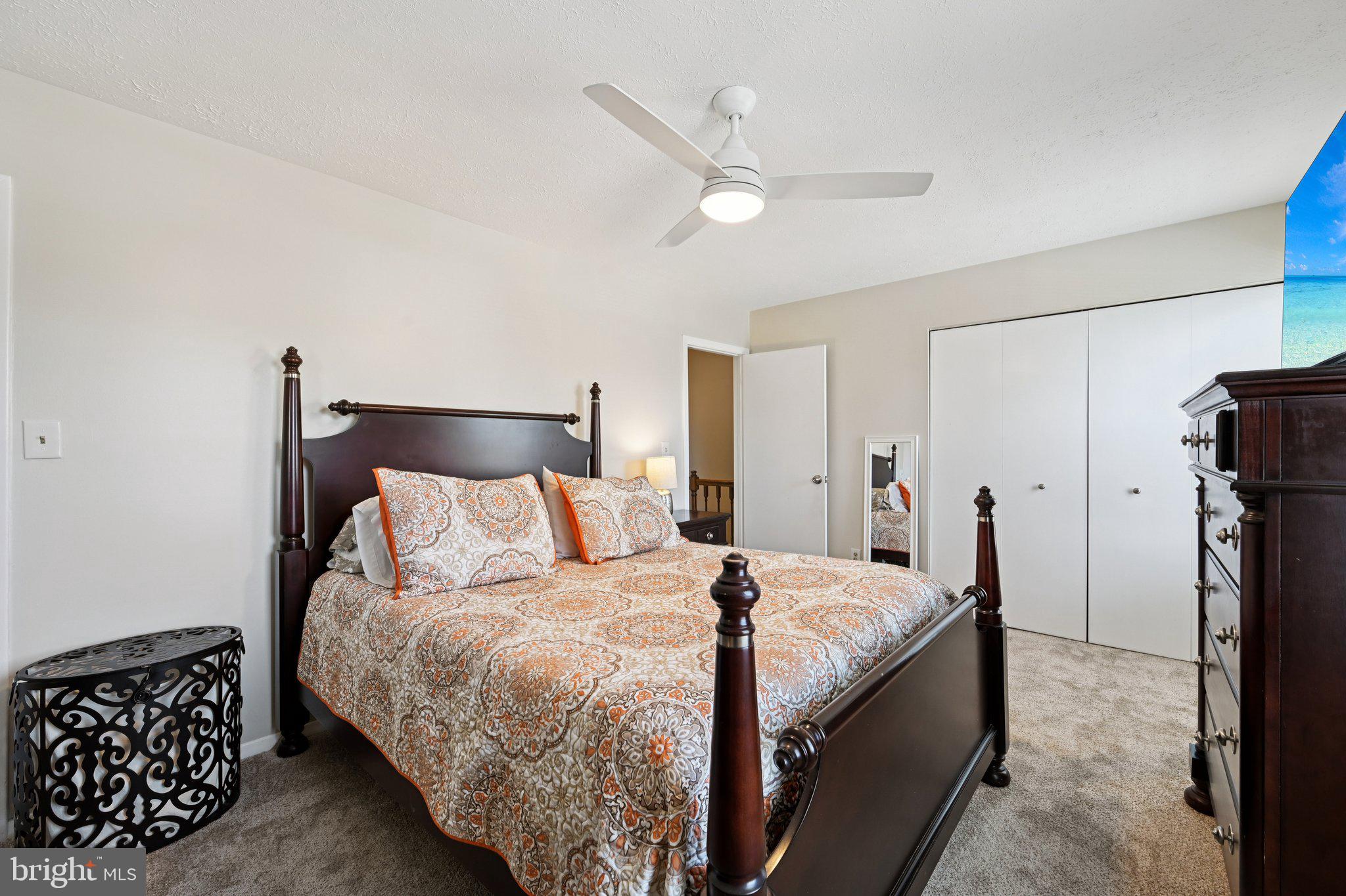 46 Bellfalls Way Baltimore, MD 21236 - Photo 32 of 65 a bedroom with a bed and a dresser