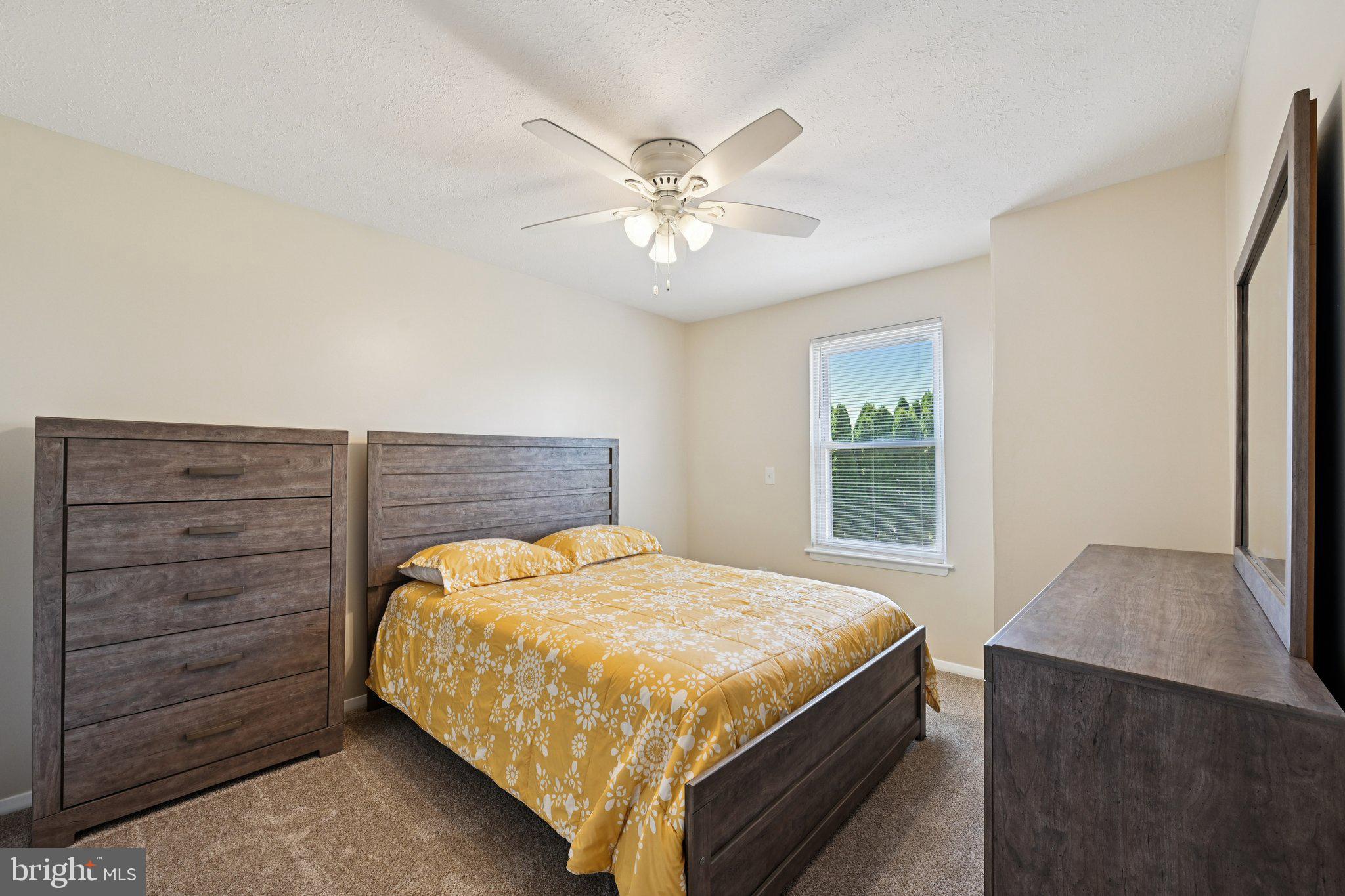 46 Bellfalls Way Baltimore, MD 21236 - Photo 35 of 65 a bedroom with a bed and window