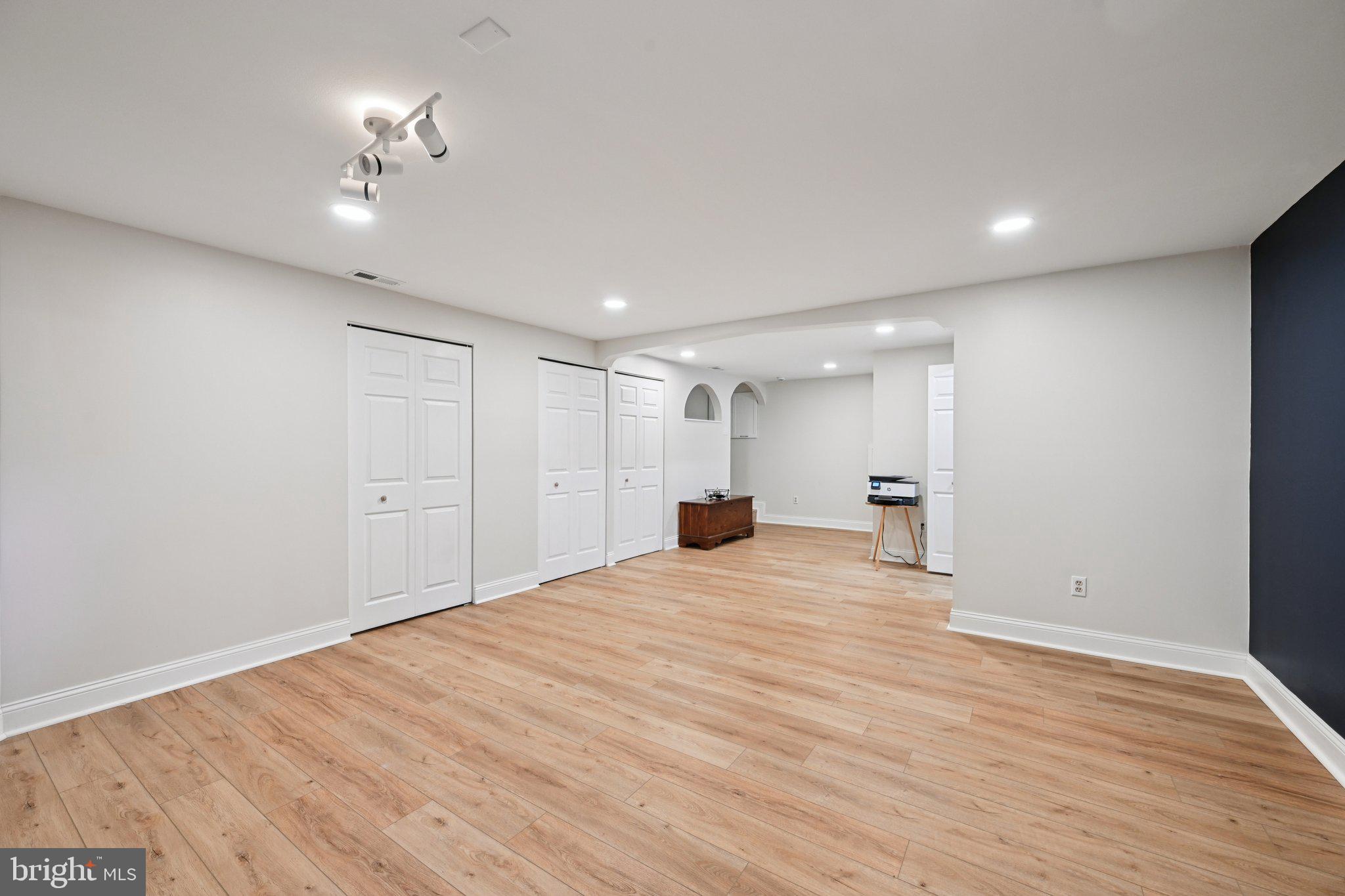 46 Bellfalls Way Baltimore, MD 21236 - Photo 46 of 65 a view of an empty room with wooden floor