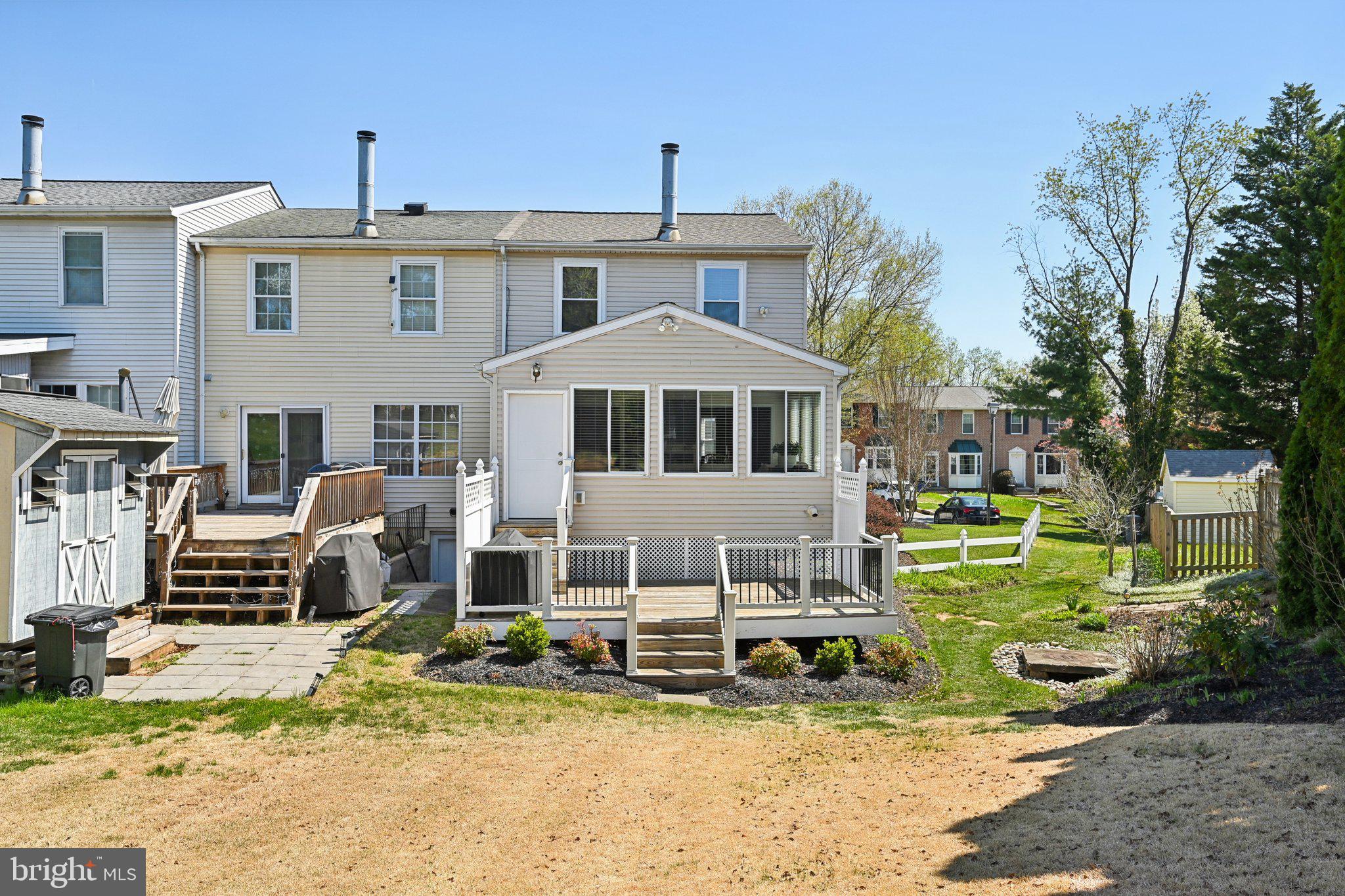 46 Bellfalls Way Baltimore, MD 21236 - Photo 49 of 65 a front view of a house with a yard