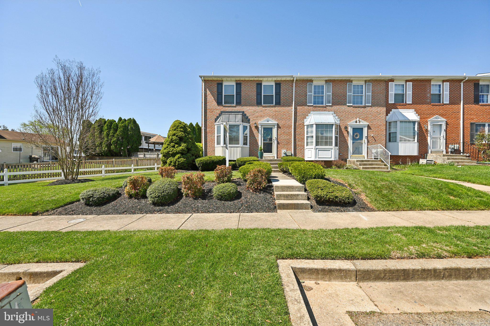 46 Bellfalls Way Baltimore, MD 21236 - Photo 60 of 65 a front view of a house with a yard
