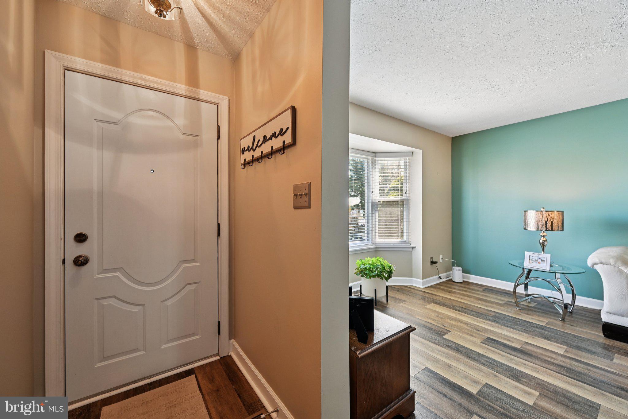 46 Bellfalls Way Baltimore, MD 21236 - Photo 7 of 65 a spacious bathroom with a granite countertop sink a mirror and shower