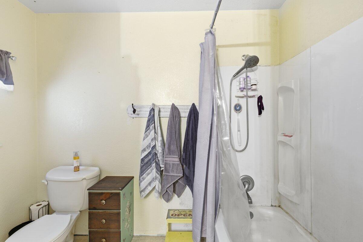 650 Sarah Lane Eagle Point, OR 97524 - Photo 14 of 19 a bathroom with a sink toilet and shower
