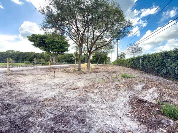 a view of backyard with green space