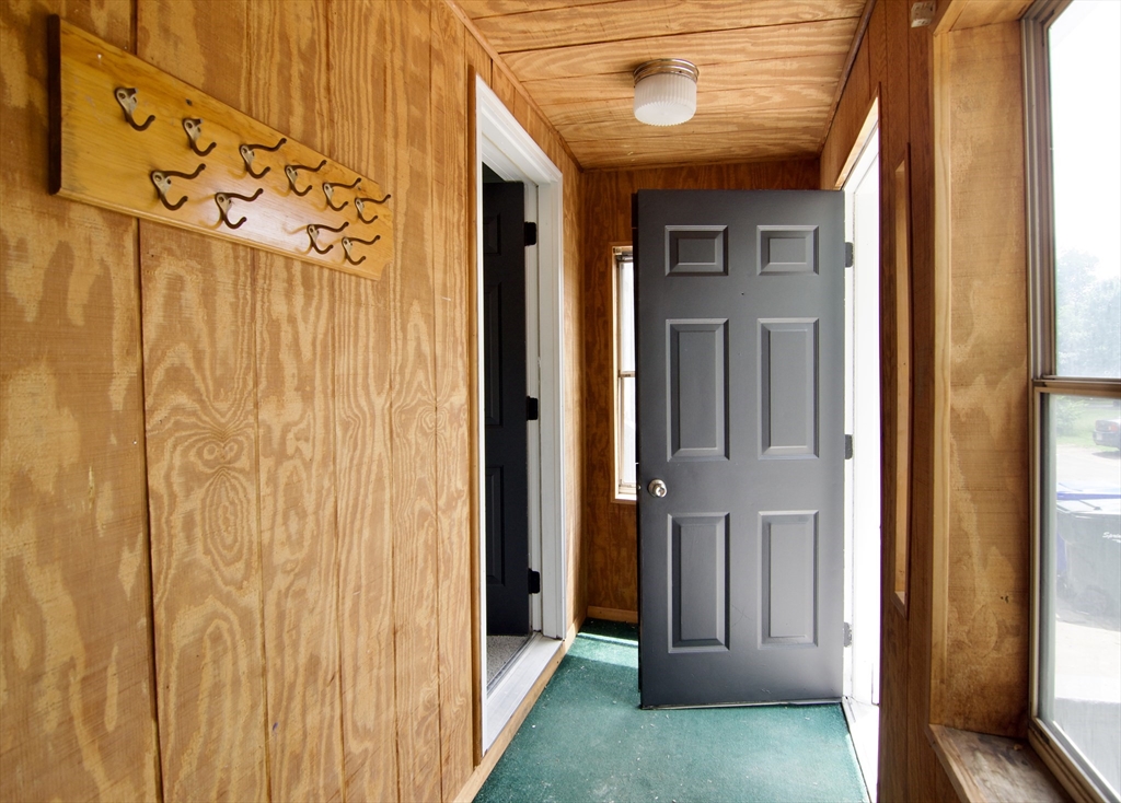 19 Greene Place Springfield, MA 01109 - Photo 2 of 36 a view of a porch with a door and a wooden door