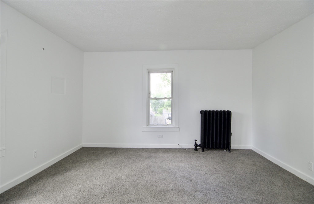 19 Greene Place Springfield, MA 01109 - Photo 28 of 36 an empty room with windows