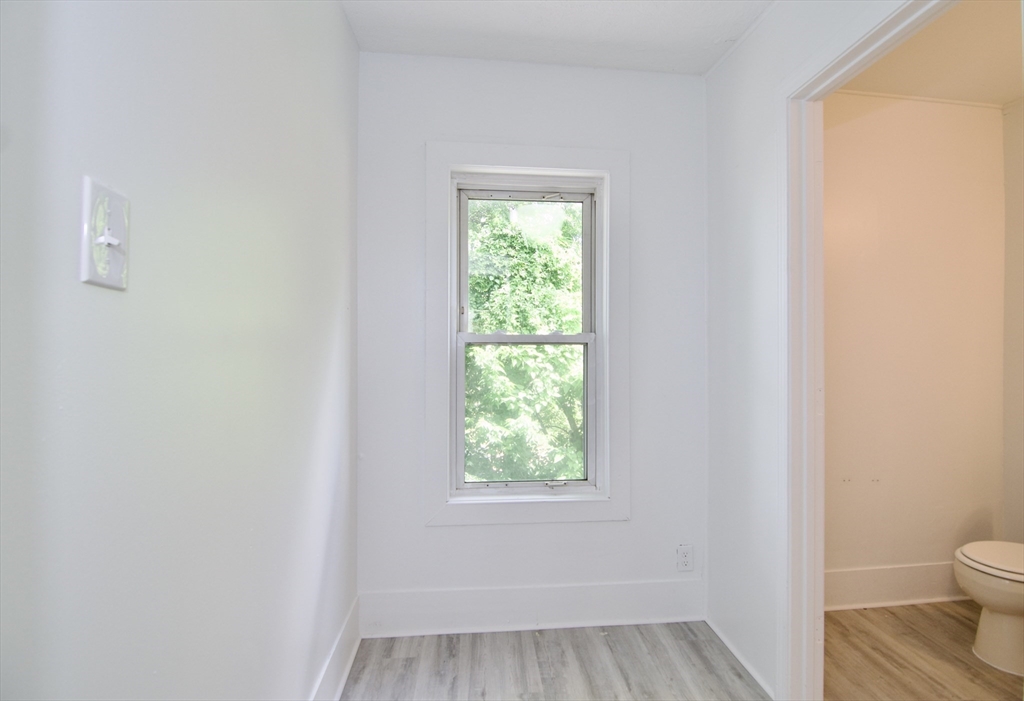 19 Greene Place Springfield, MA 01109 - Photo 32 of 36 a view of a bathroom that has a window in it