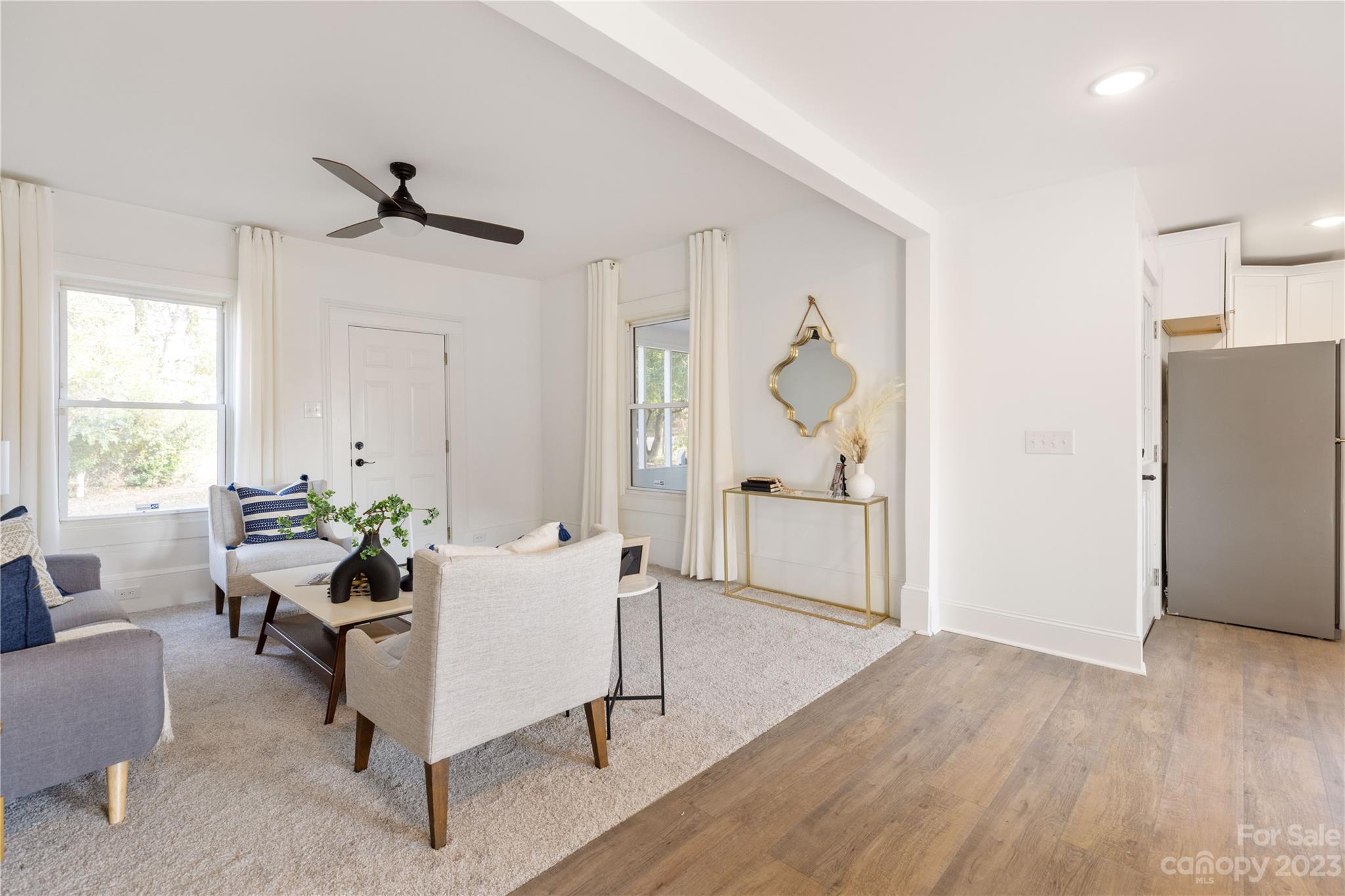 201 Hicks Circle Mount Holly, NC 28120 - Photo 14 of 23 a living room with furniture and wooden floor