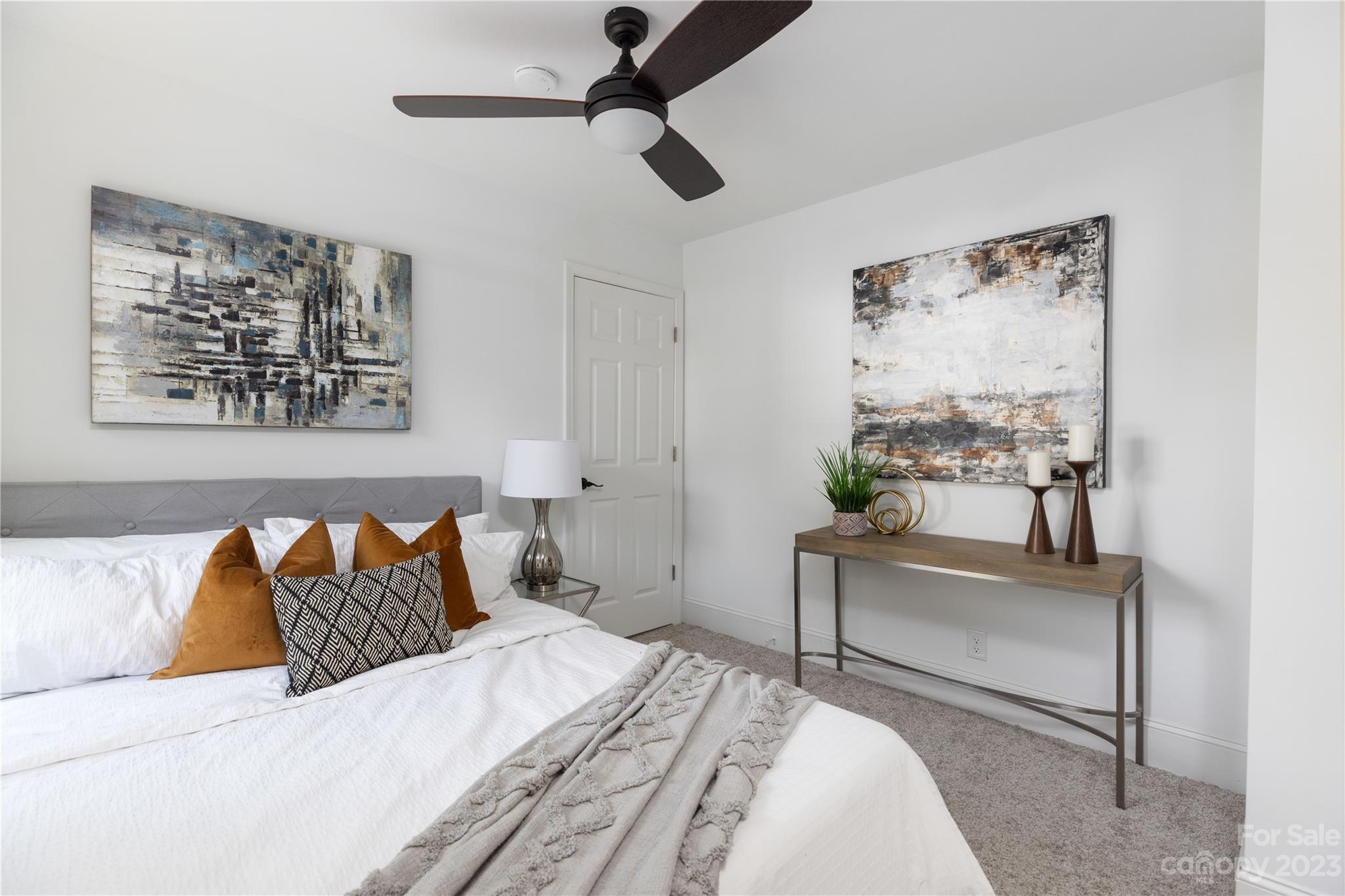 201 Hicks Circle Mount Holly, NC 28120 - Photo 16 of 23 a bedroom with a bed and a painting on the wall