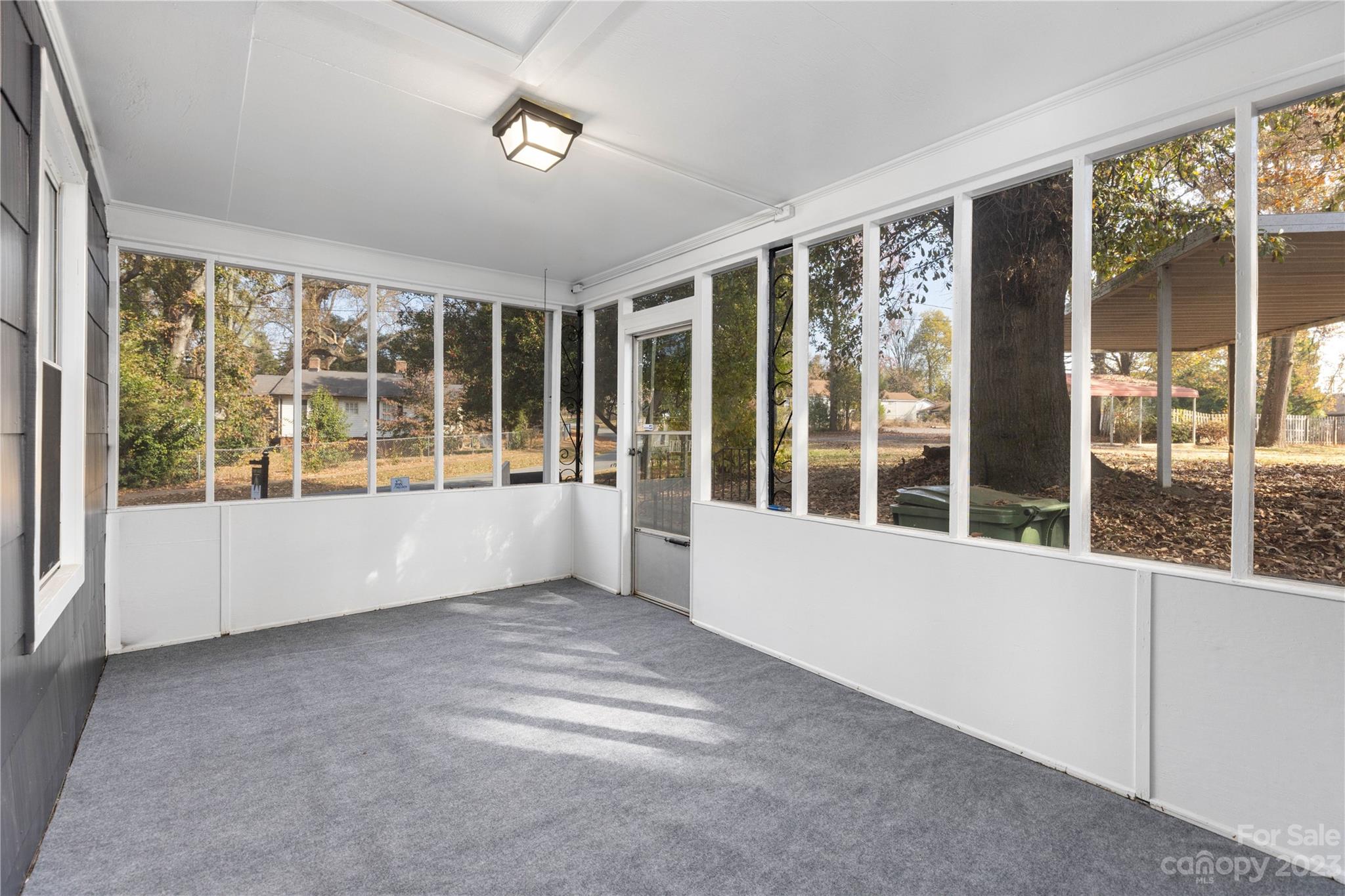201 Hicks Circle Mount Holly, NC 28120 - Photo 22 of 23 a view of an empty room with a large window