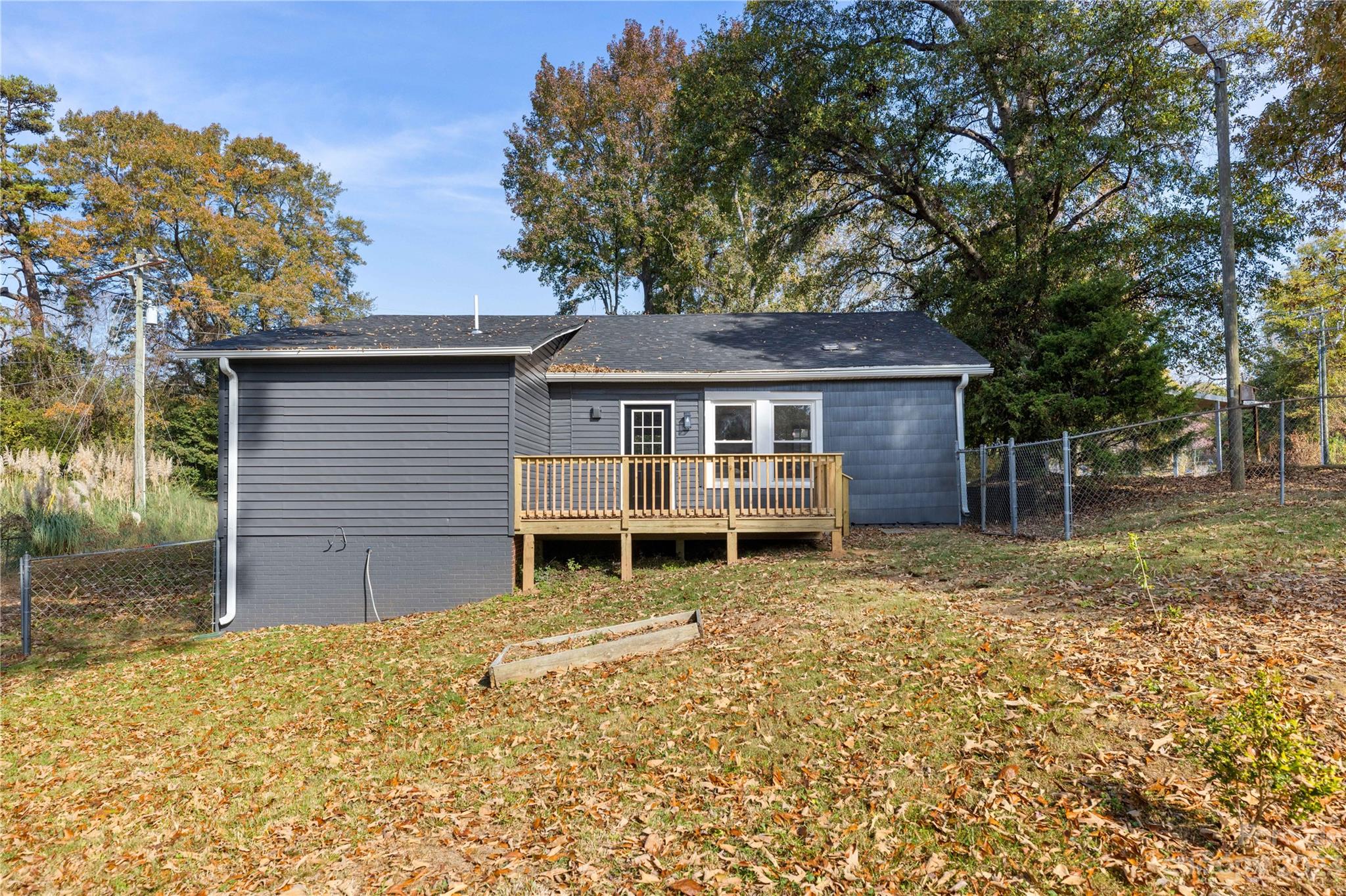 201 Hicks Circle Mount Holly, NC 28120 - Photo 23 of 23 a house with trees in the background