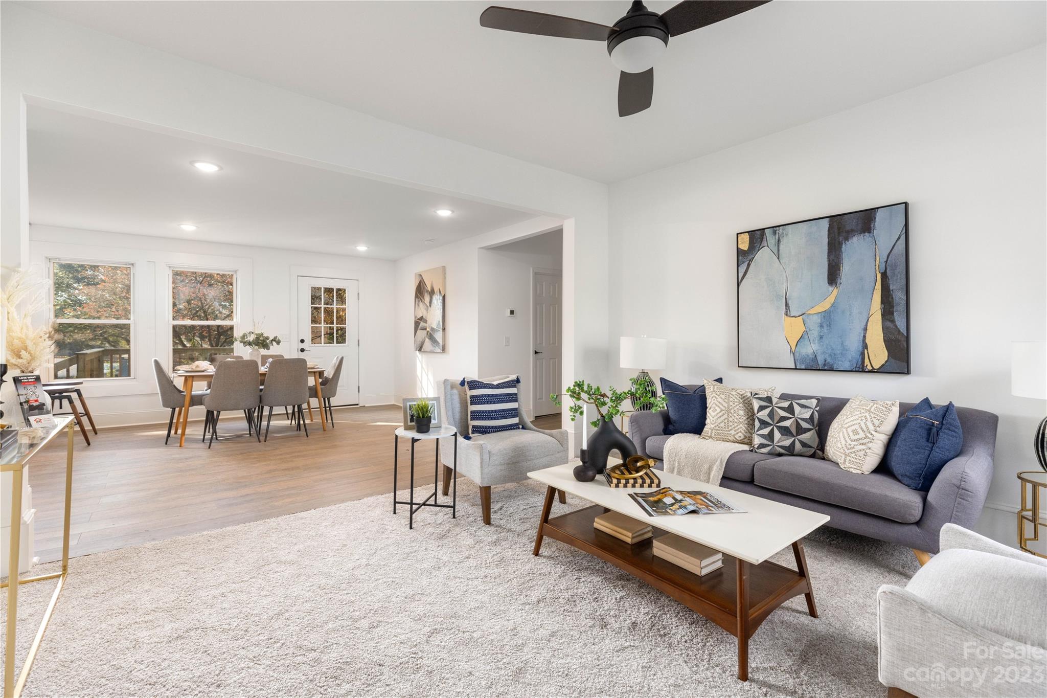 201 Hicks Circle Mount Holly, NC 28120 - Photo 4 of 23 a living room with furniture and a view of kitchen