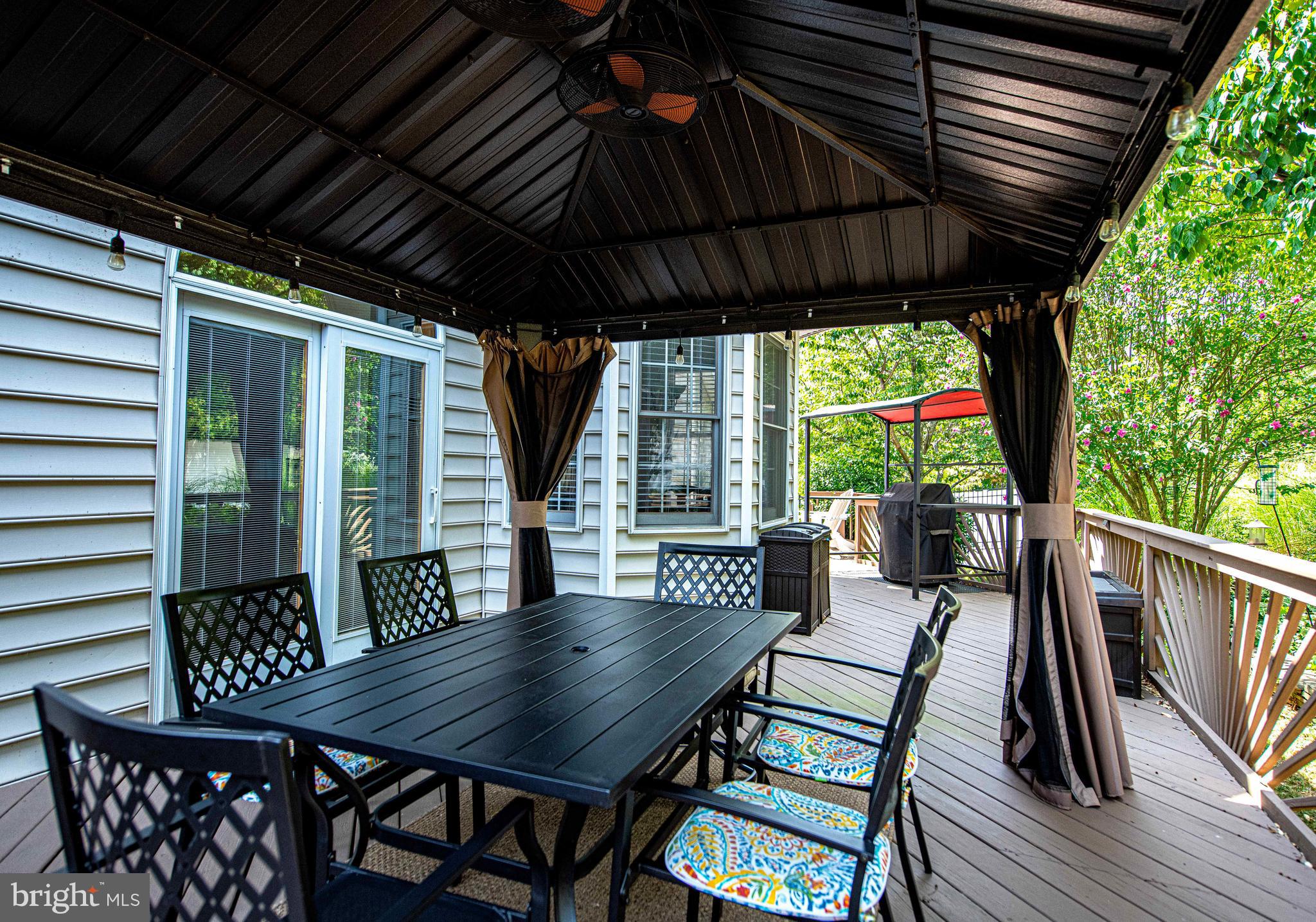 8506 Marblehead Road Lutherville-Timonium, MD 21093 - Photo 43 of 70 Huge back deck for entertaining. Awning conveys!