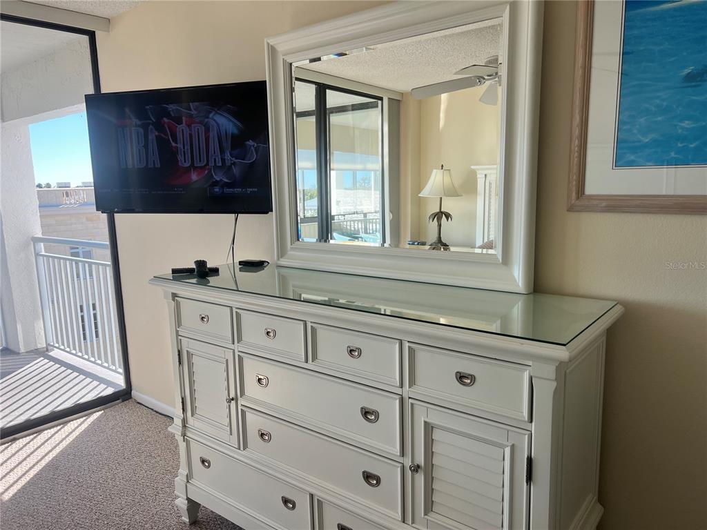 1001 Point Of Rocks Road, Unit 609 Sarasota, FL 34242 - Photo 18 of 41 a kitchen with granite countertop cabinets and window