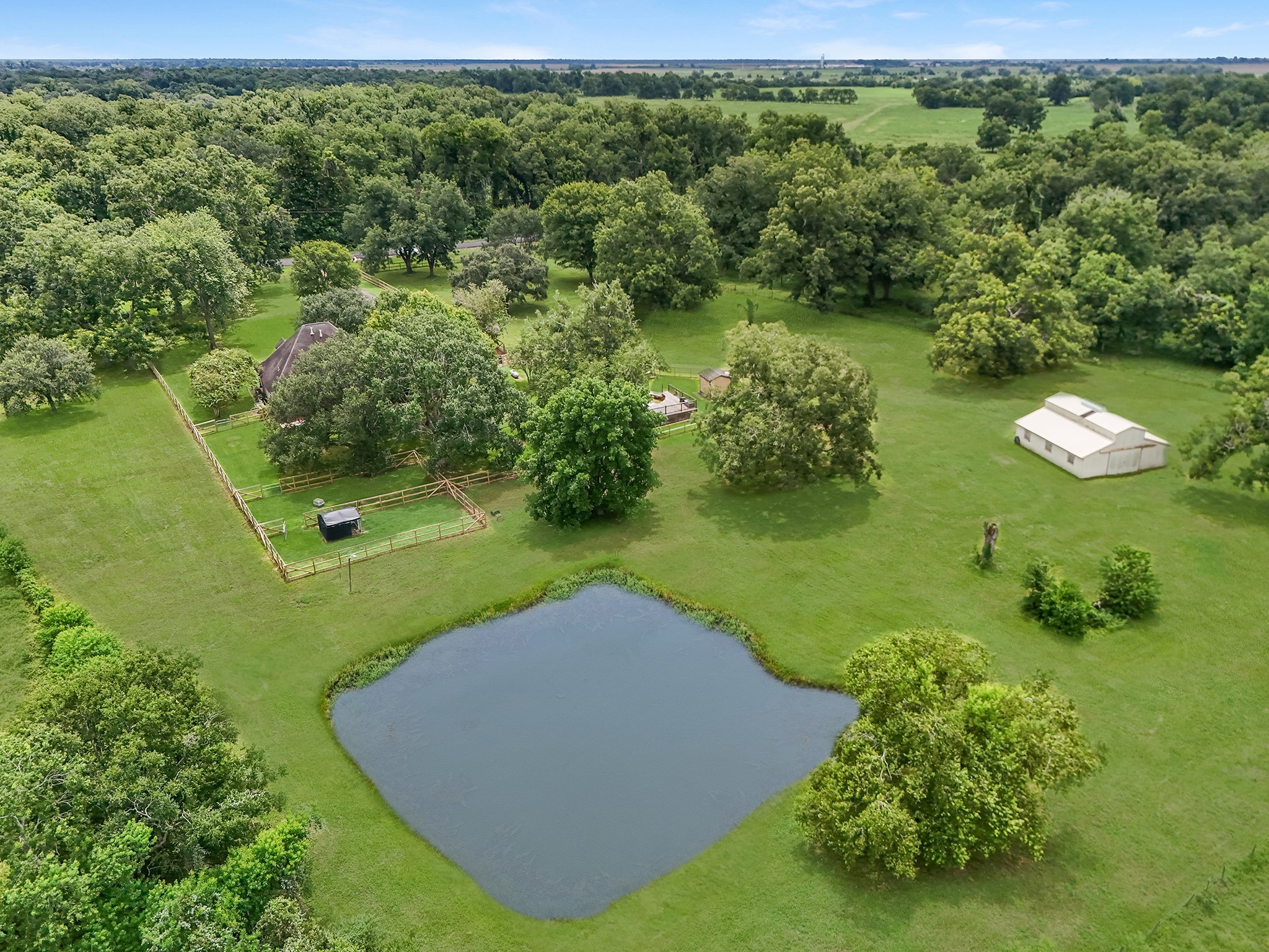 17126 County Road 39 Rosharon, TX 77583 - Photo 18 of 47 a view of a lake with a yard