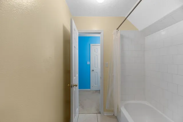 a view of balcony with furniture