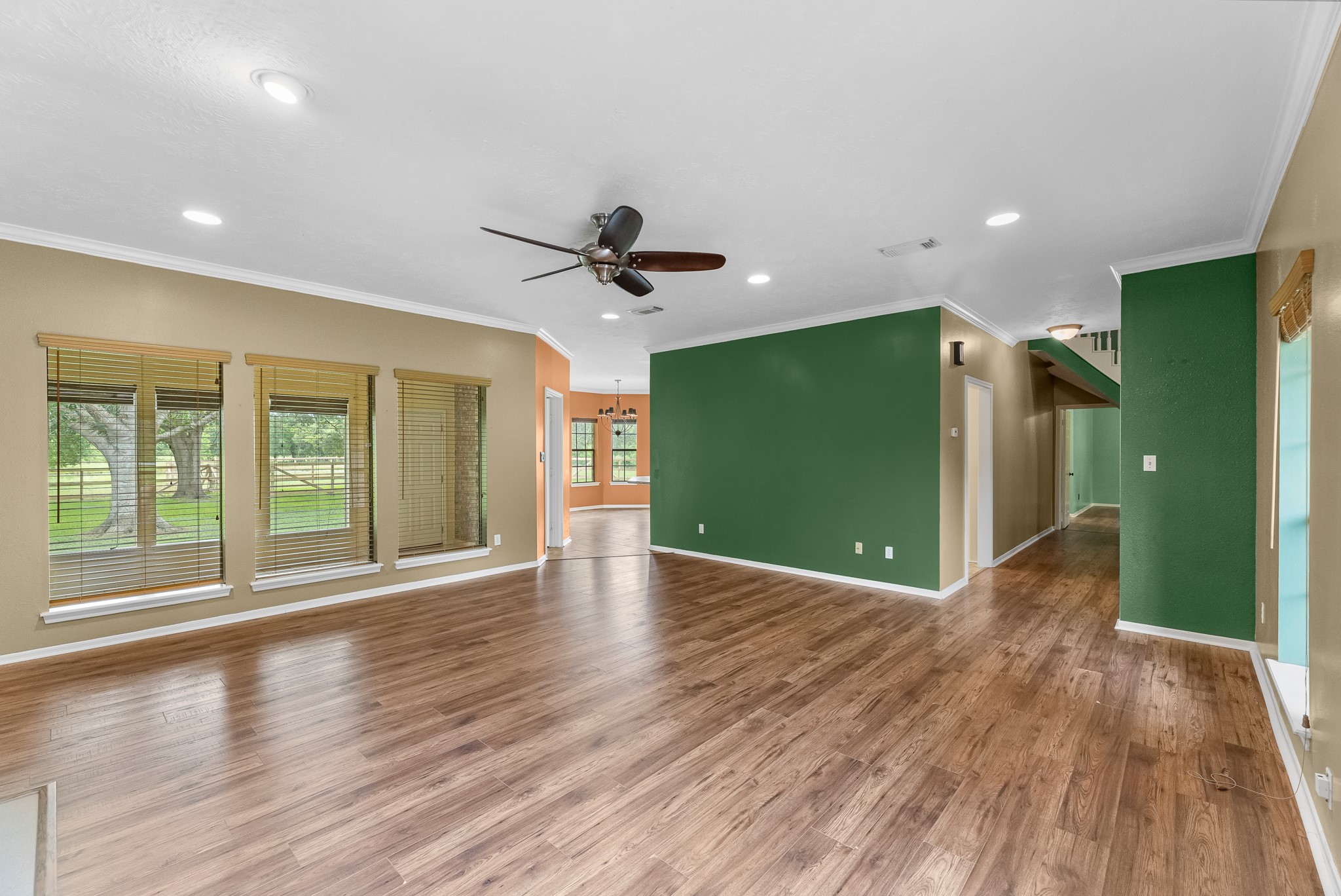 17126 County Road 39 Rosharon, TX 77583 - Photo 35 of 47 a view of an empty room with wooden floor and a window