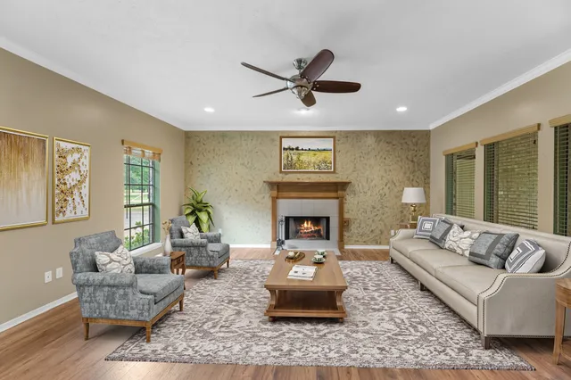 a bathroom with a granite countertop sink mirror and vanity