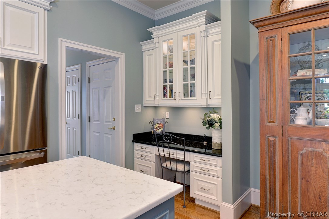 1632 River Ridge Williamsburg, VA 23185 - Photo 15 of 49 a kitchen with a refrigerator a stove and cabinets