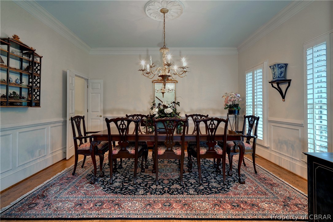 1632 River Ridge Williamsburg, VA 23185 - Photo 19 of 49 a view of a dining room with furniture and wooden floor