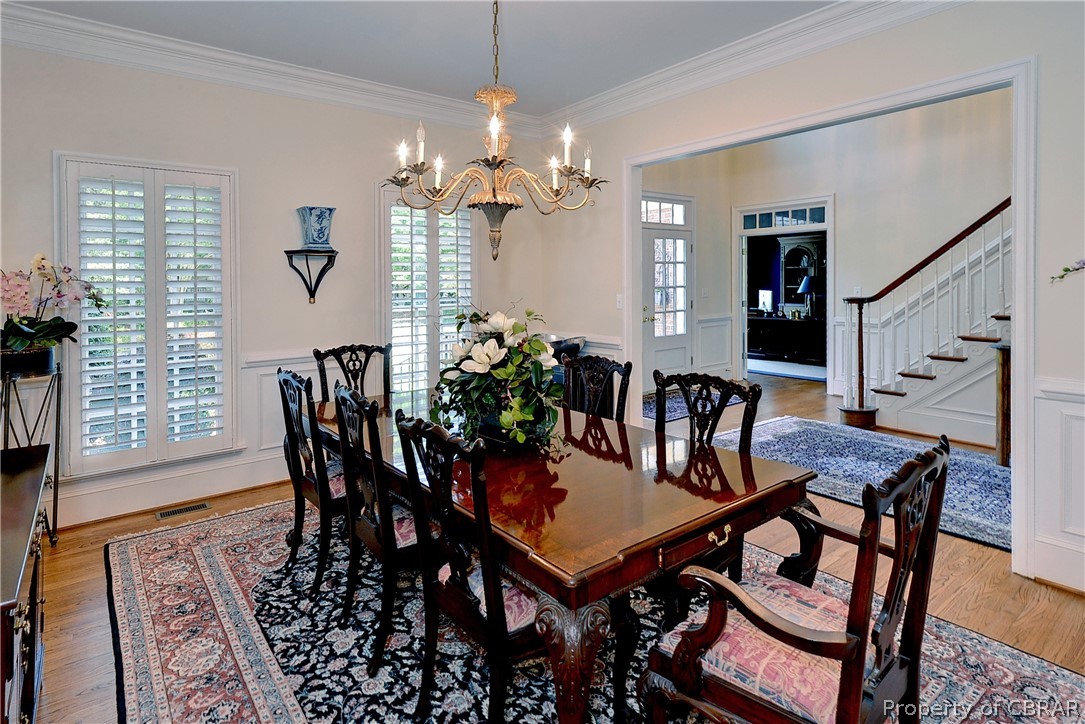 1632 River Ridge Williamsburg, VA 23185 - Photo 20 of 49 a view of a dining room with furniture and wooden floor