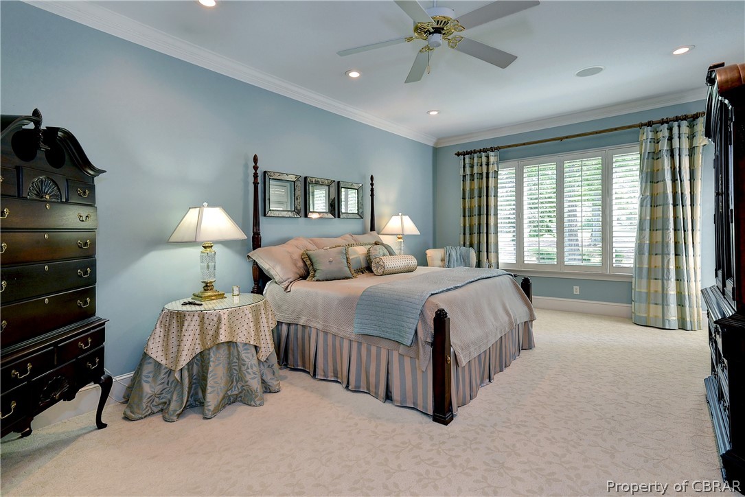 1632 River Ridge Williamsburg, VA 23185 - Photo 22 of 49 a bedroom with bed and a chandelier