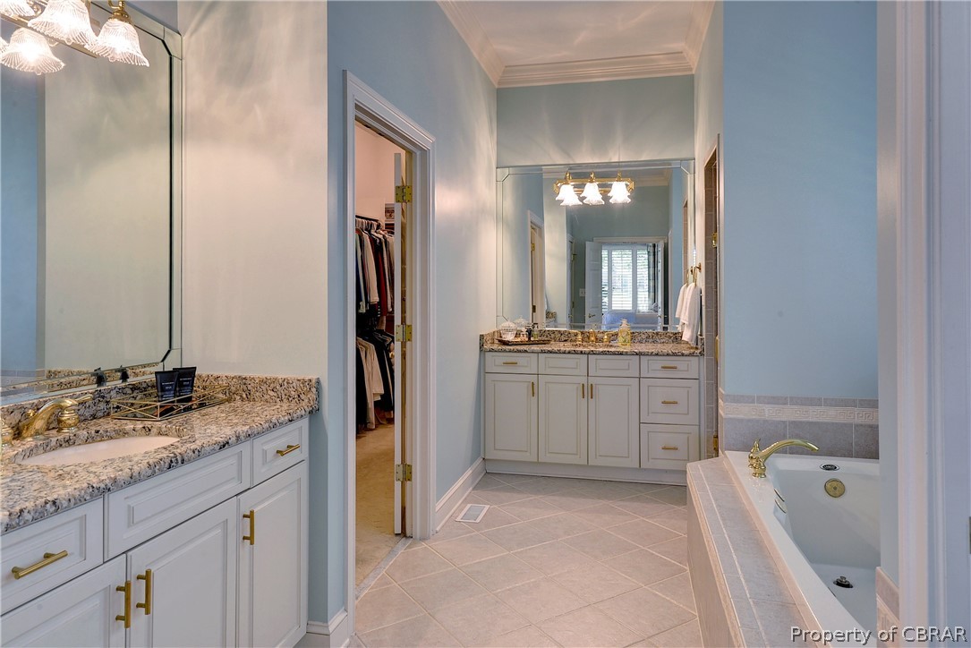 1632 River Ridge Williamsburg, VA 23185 - Photo 24 of 49 a bathroom with a granite countertop sink mirror and bathtub