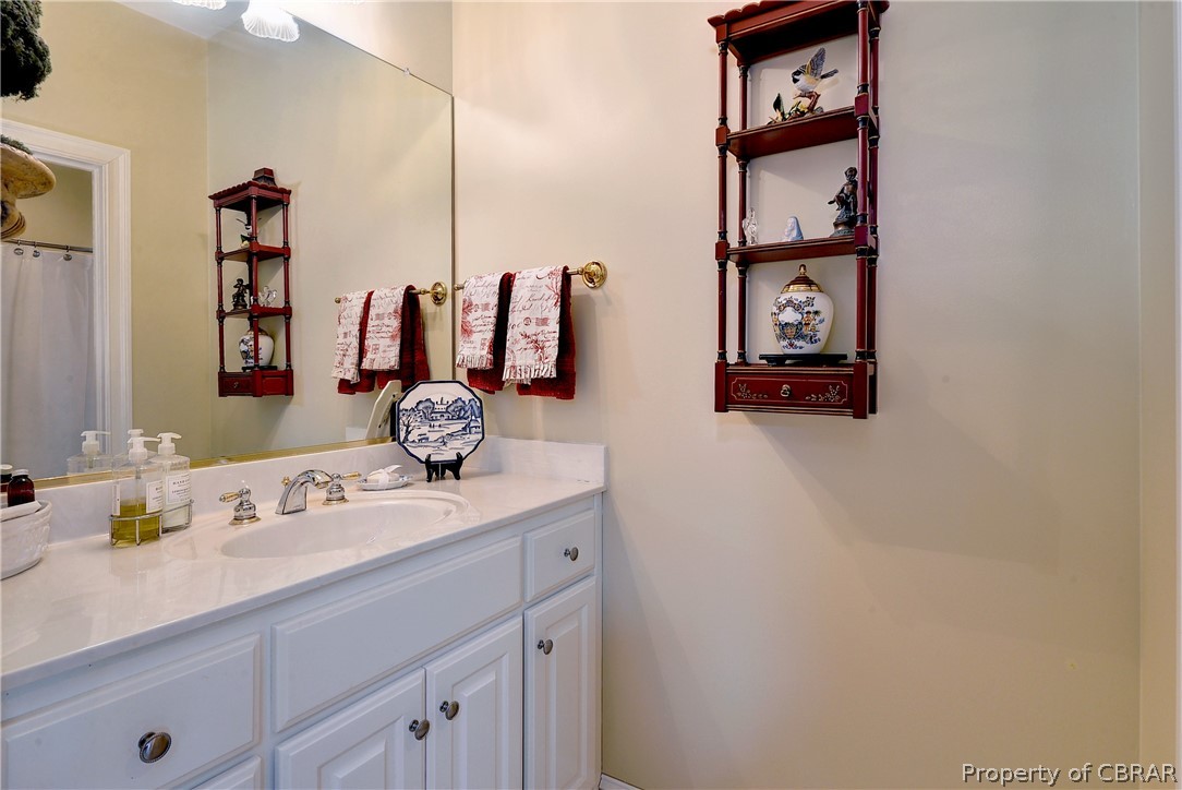 1632 River Ridge Williamsburg, VA 23185 - Photo 37 of 49 a bathroom with a sink and a mirror
