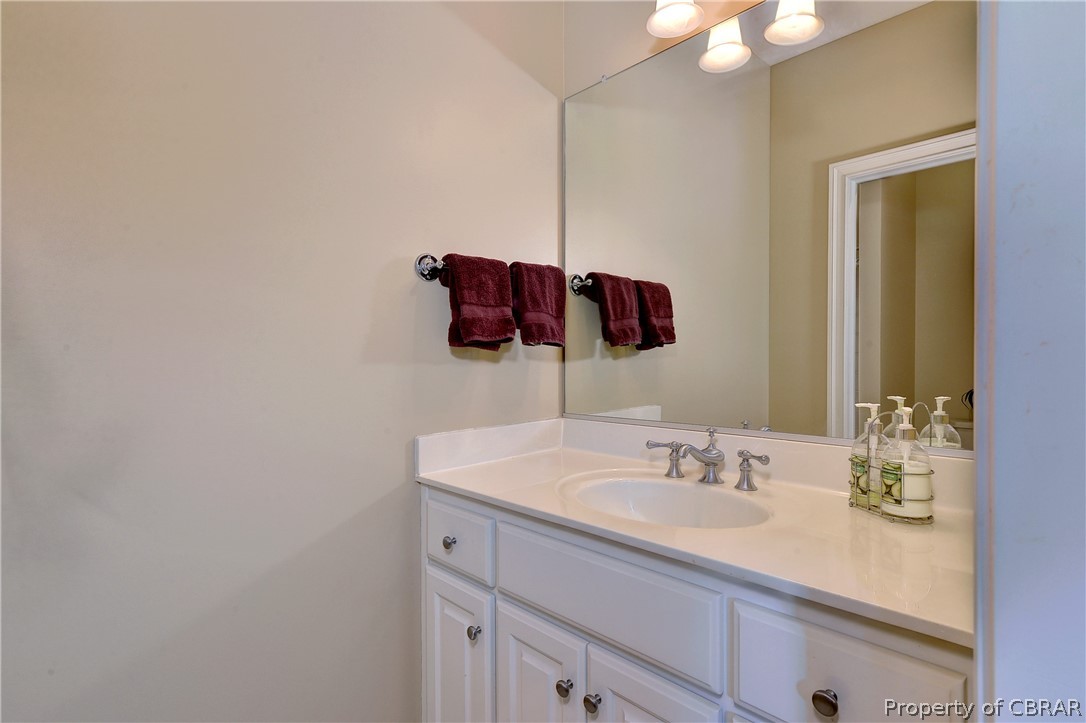 1632 River Ridge Williamsburg, VA 23185 - Photo 39 of 49 a bathroom with a sink and a mirror