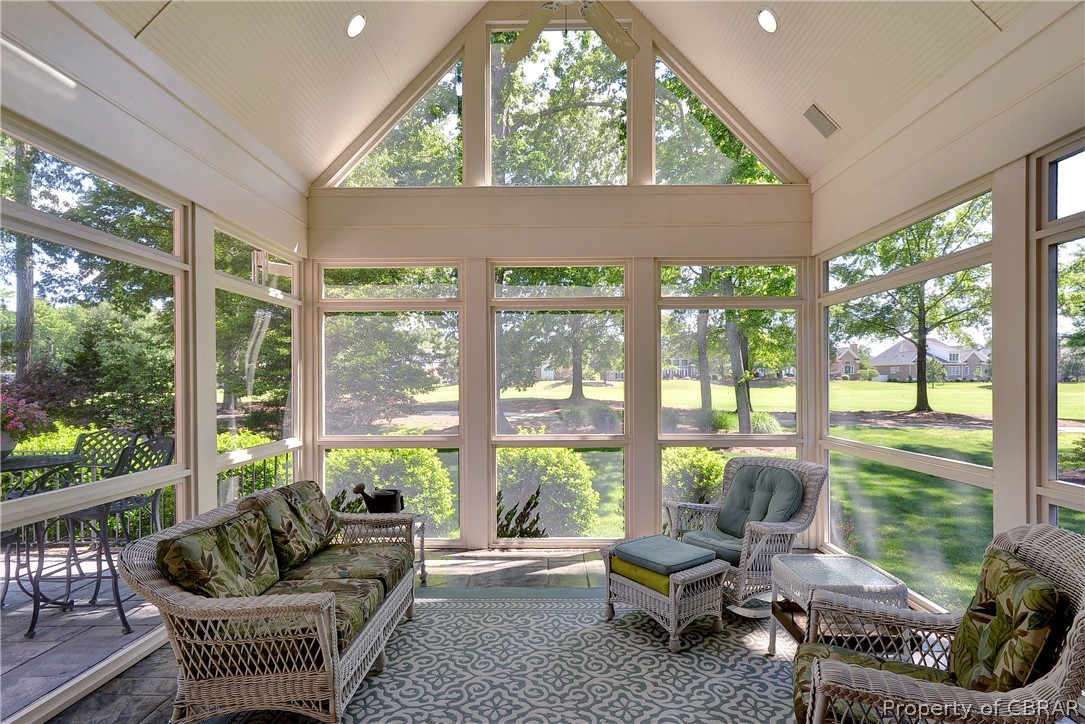 1632 River Ridge Williamsburg, VA 23185 - Photo 40 of 49 a living room with furniture and a floor to ceiling window