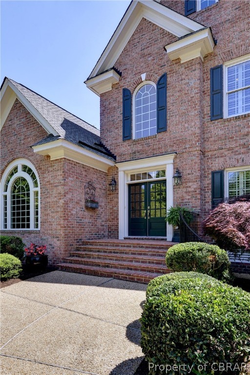 1632 River Ridge Williamsburg, VA 23185 - Photo 4 of 49 a front view of a house with garden