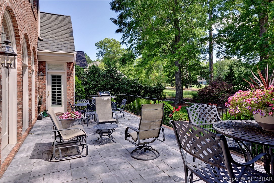 1632 River Ridge Williamsburg, VA 23185 - Photo 41 of 49 a view of a patio with a table and chairs