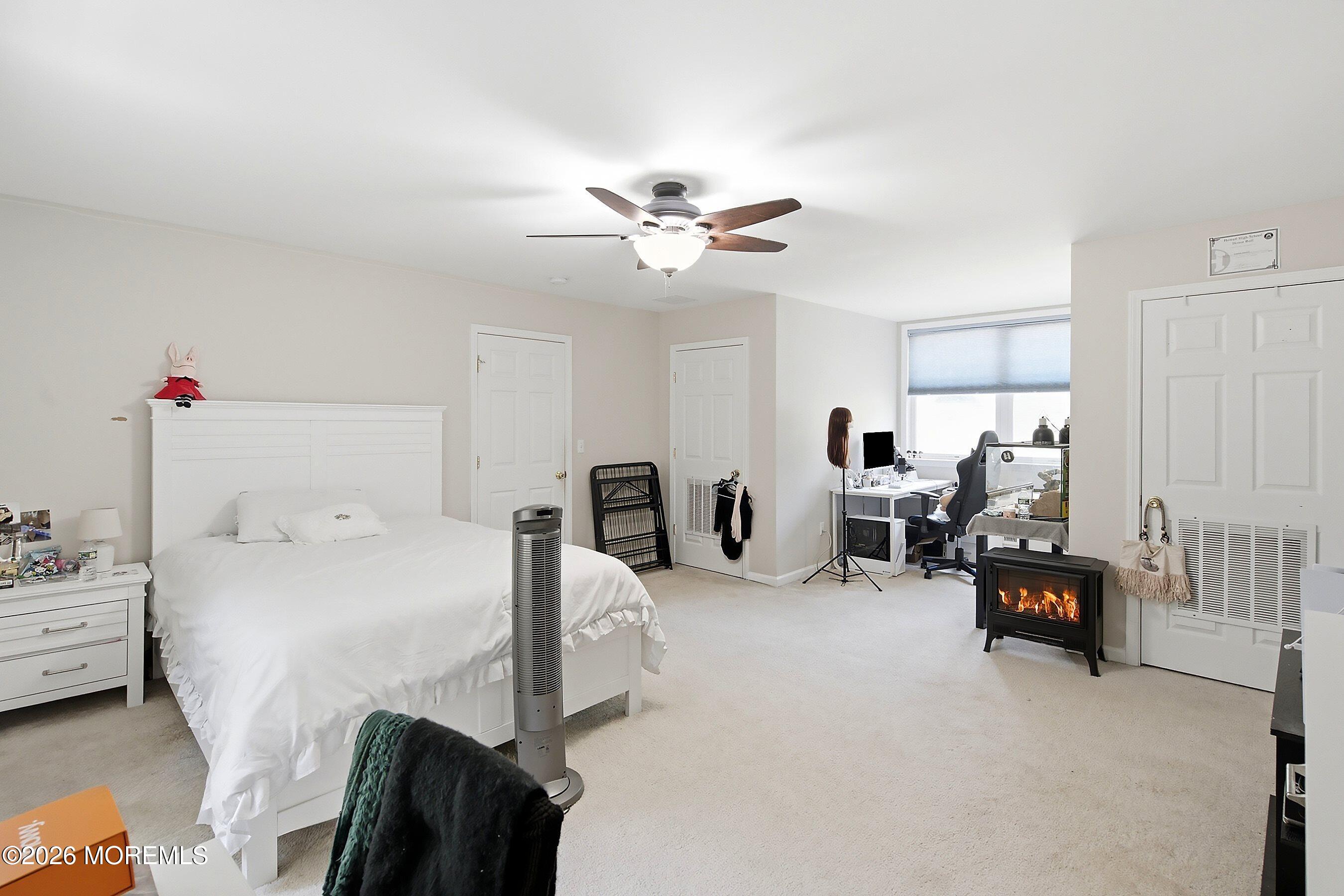 935 Bethel Church Road Jackson, NJ 08527 - Photo 20 of 32 a bed room with a bed furniture and a chair