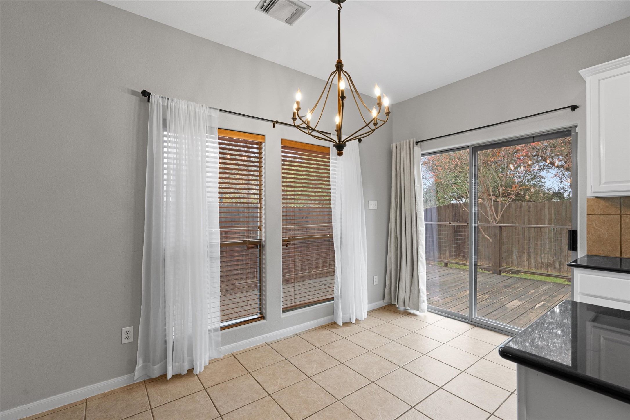 2240 Independence Drive, Unit A83 Austin, TX 78745 - Photo 11 of 34 a view of empty room with wooden floor and fan